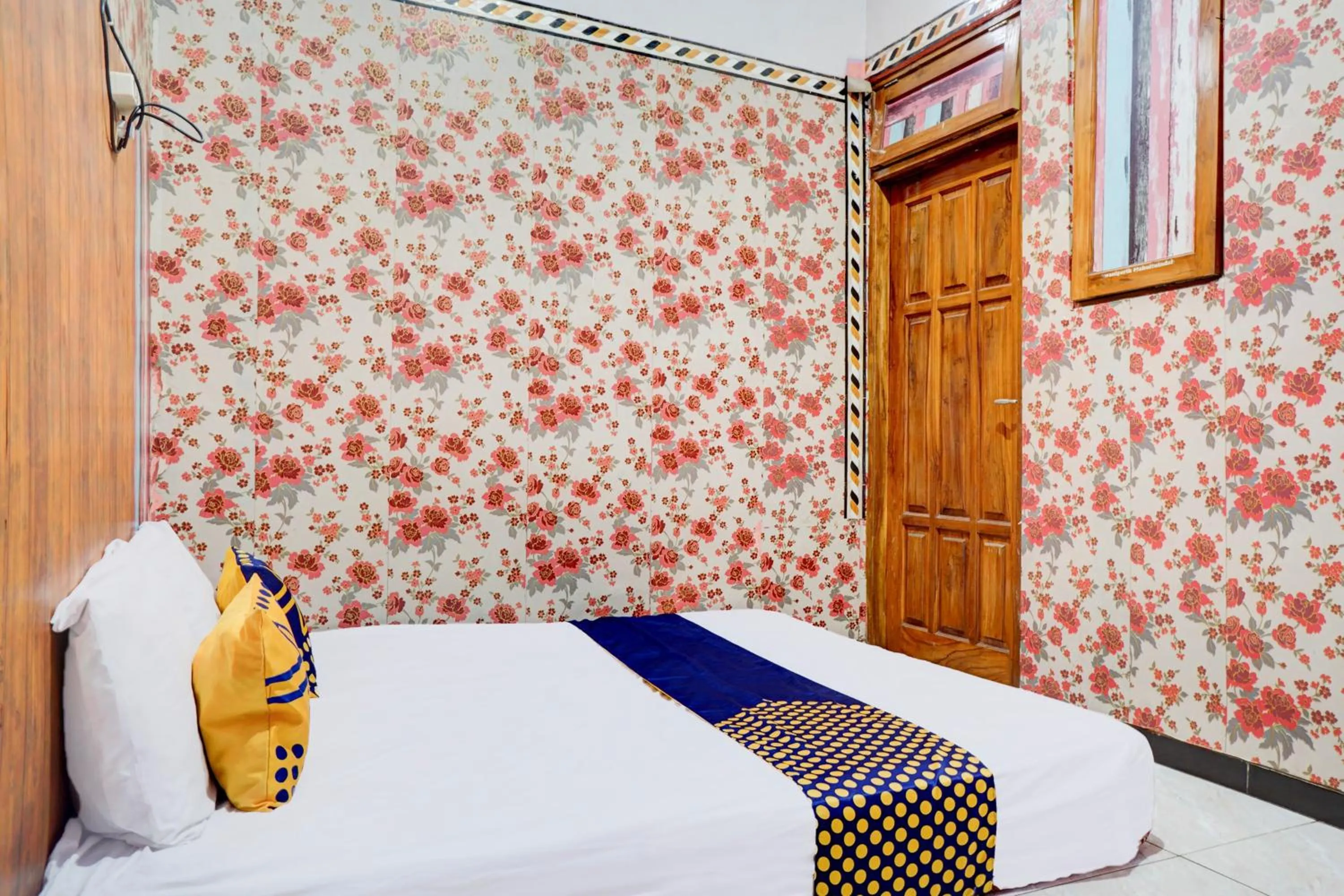 Bedroom in Hotel O Karman's Sari 1 Homestay Syariah