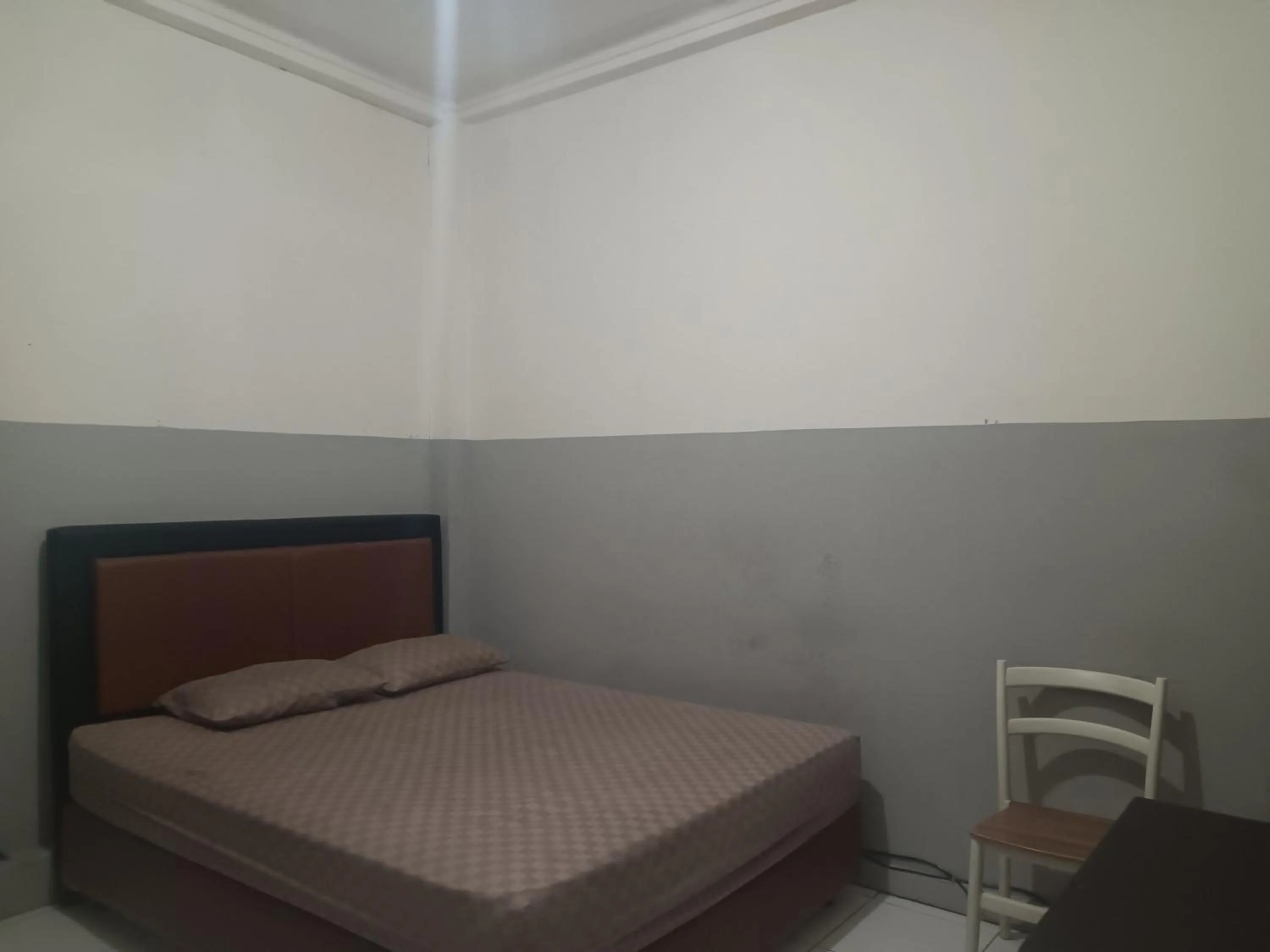 Bedroom, Bed in OYO 93090 Multi Plus Inn