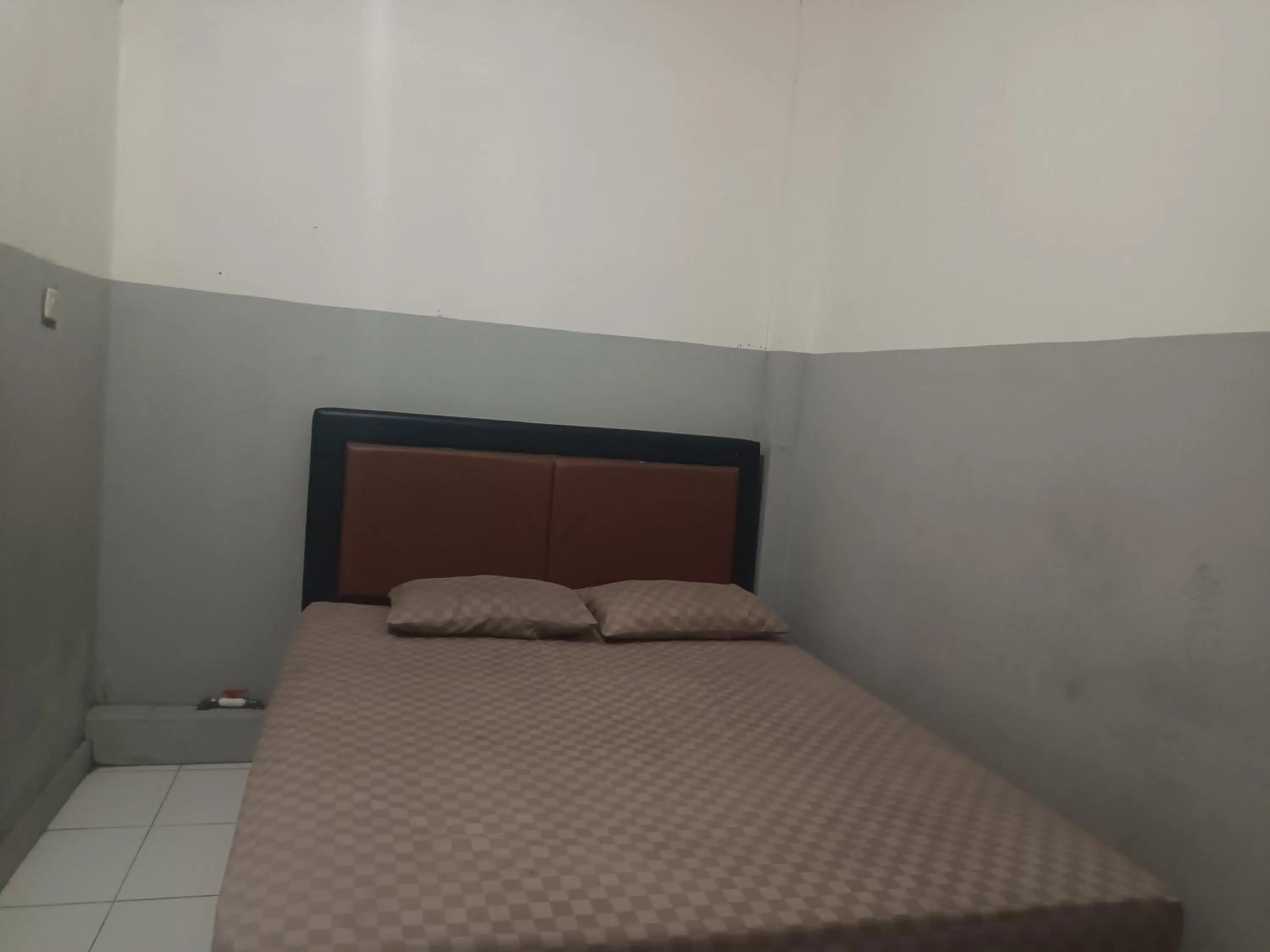 Bedroom, Bed in OYO 93090 Multi Plus Inn