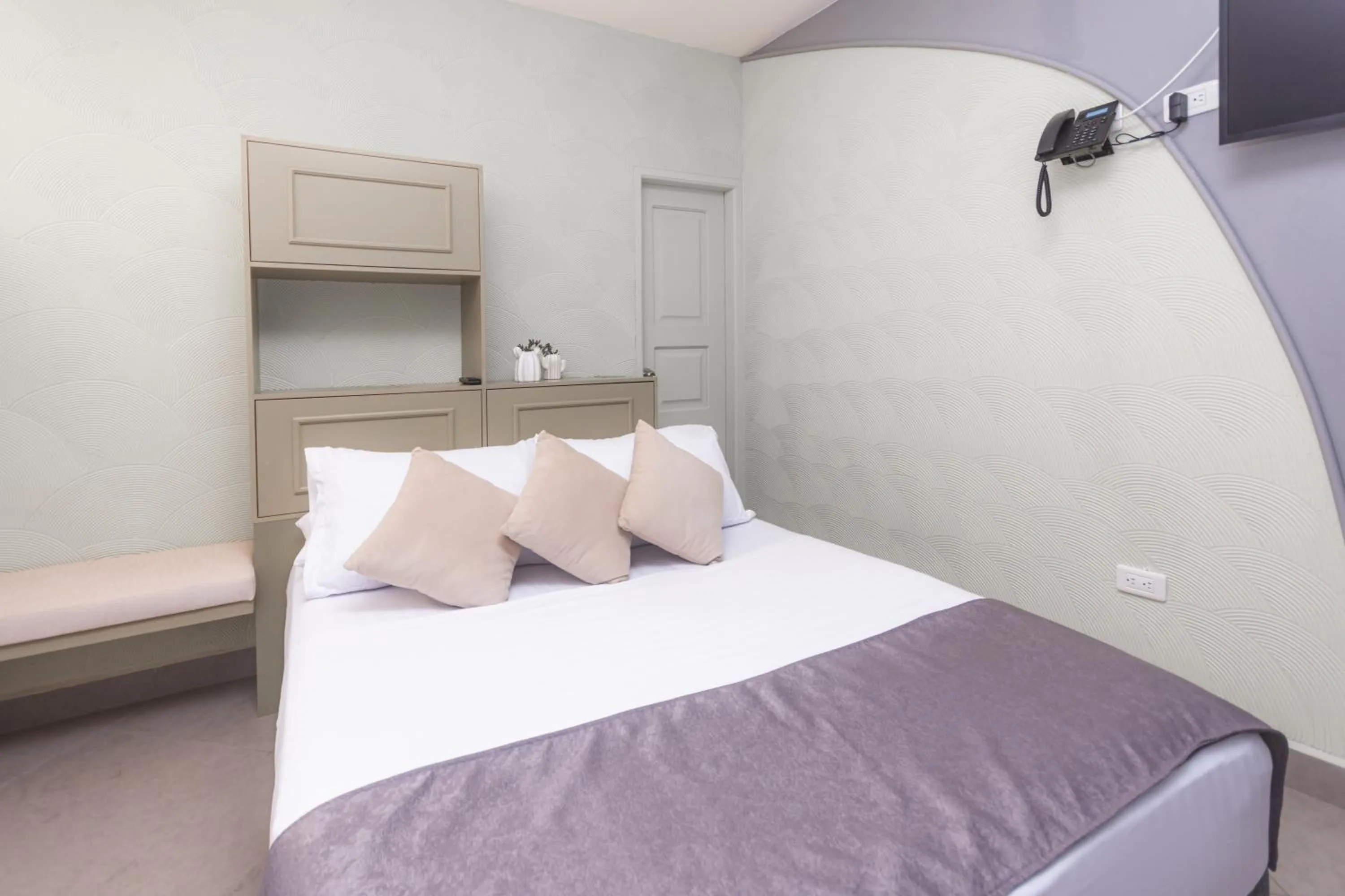 Bed in Hotel Chromatic