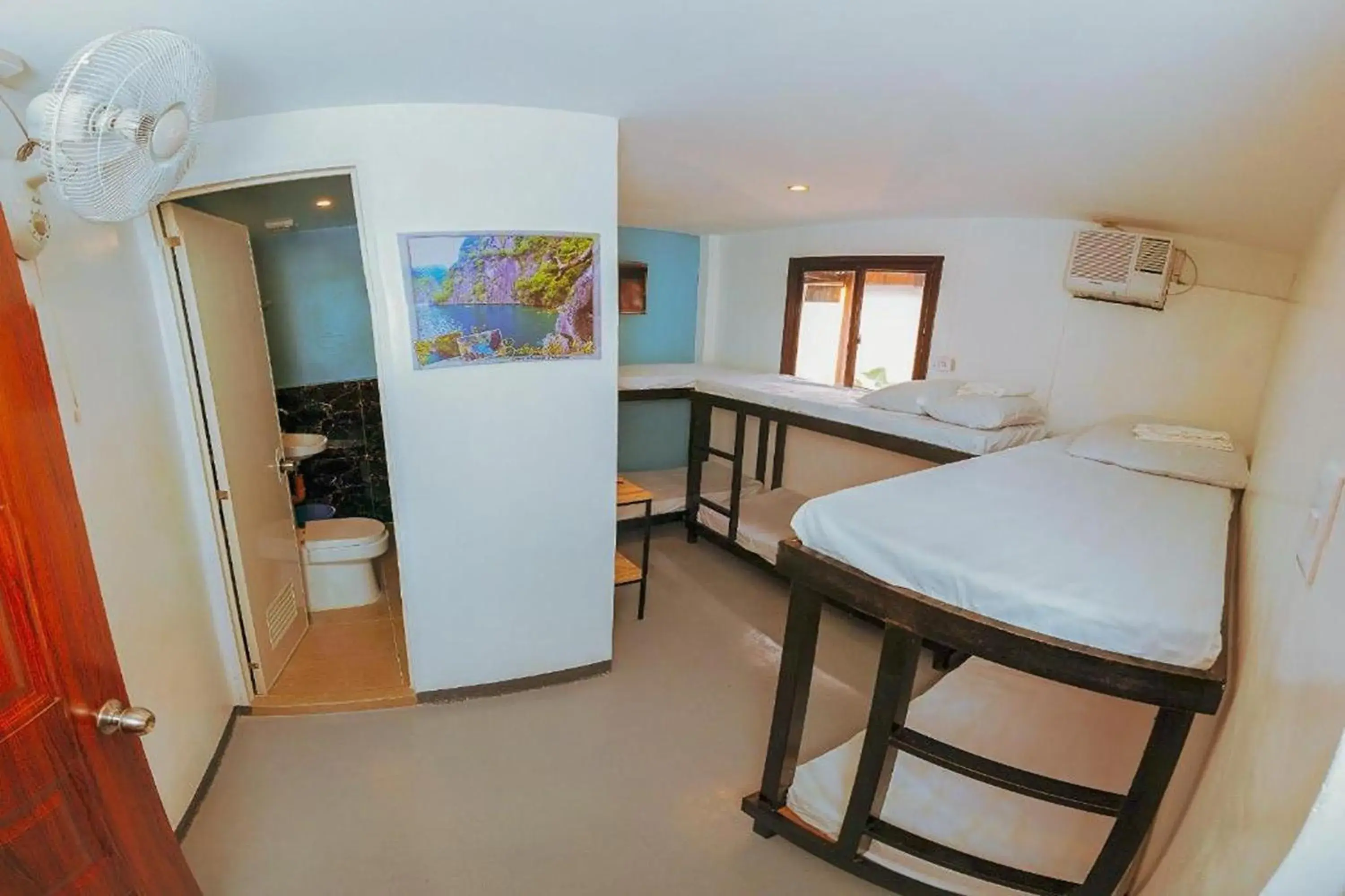 Bed in Adventourist Inn Coron Bed in Adventourist Inn Coron