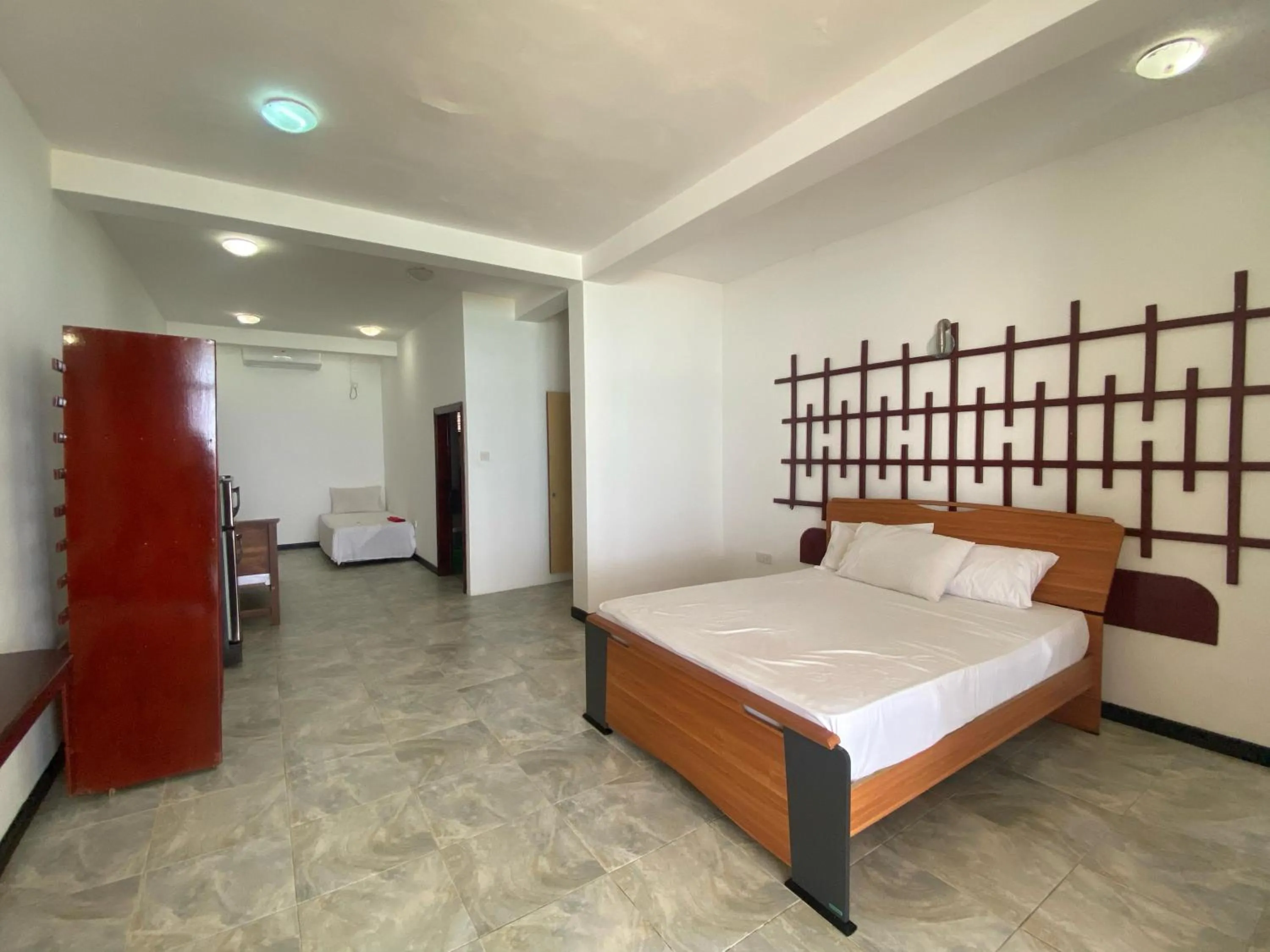 Bed in WASANA beach hotel