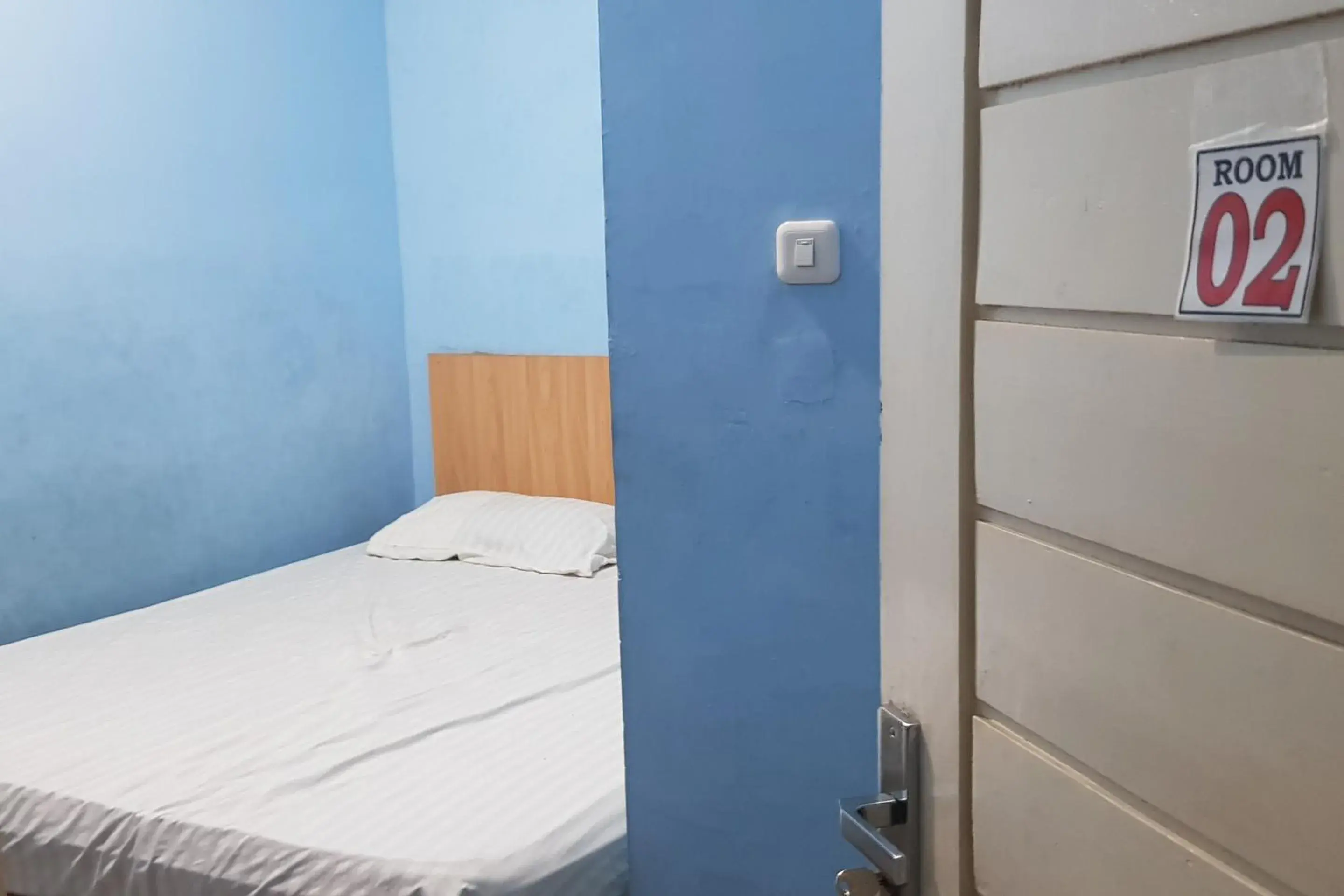 Deluxe Double Room in Hotel O Cempaka Syariah Deluxe Double Room in Hotel O Cempaka Syariah