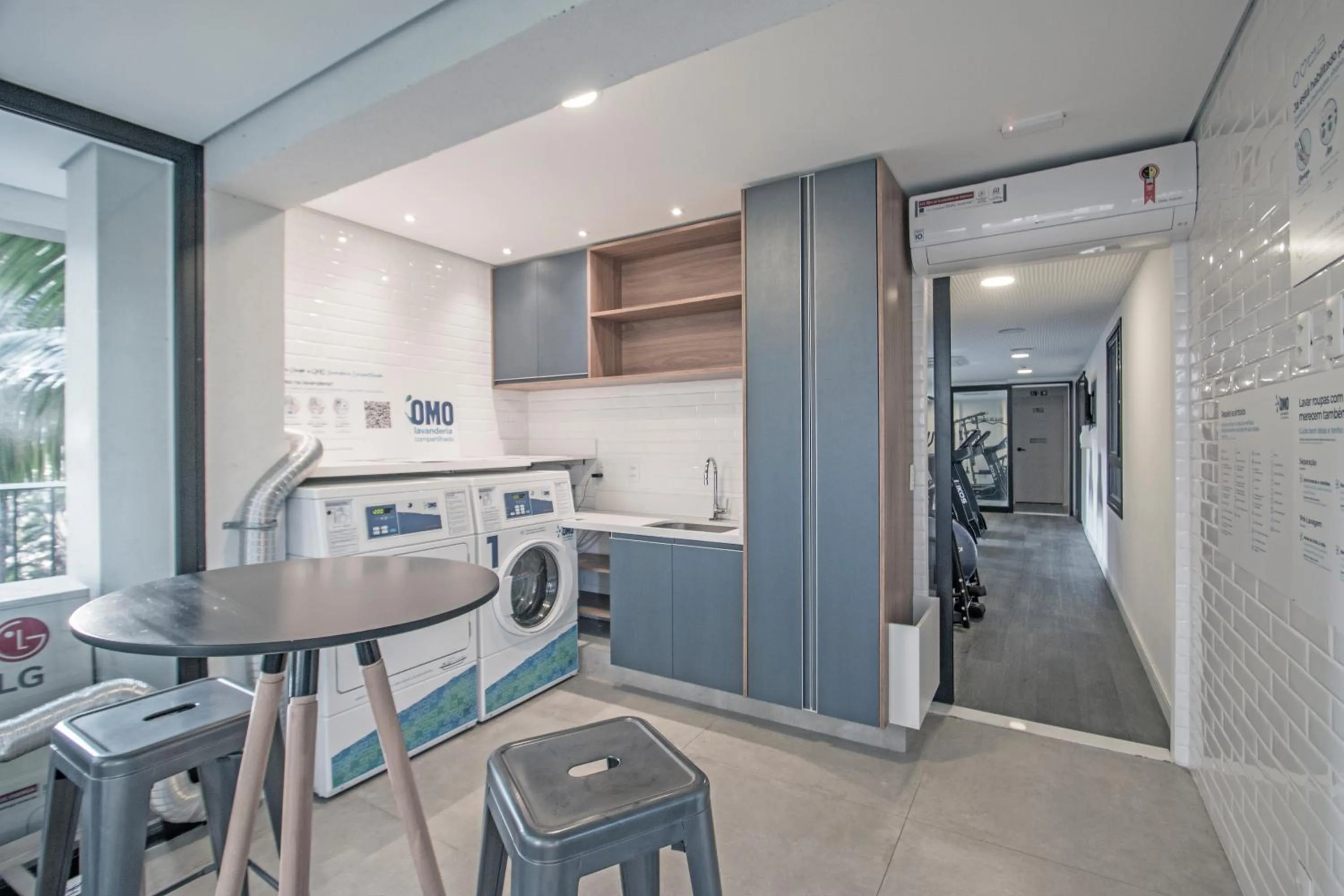 laundry in Next Home Design by Viva - Apartamentos em prédio próximo ao Parque do Ibirapuera