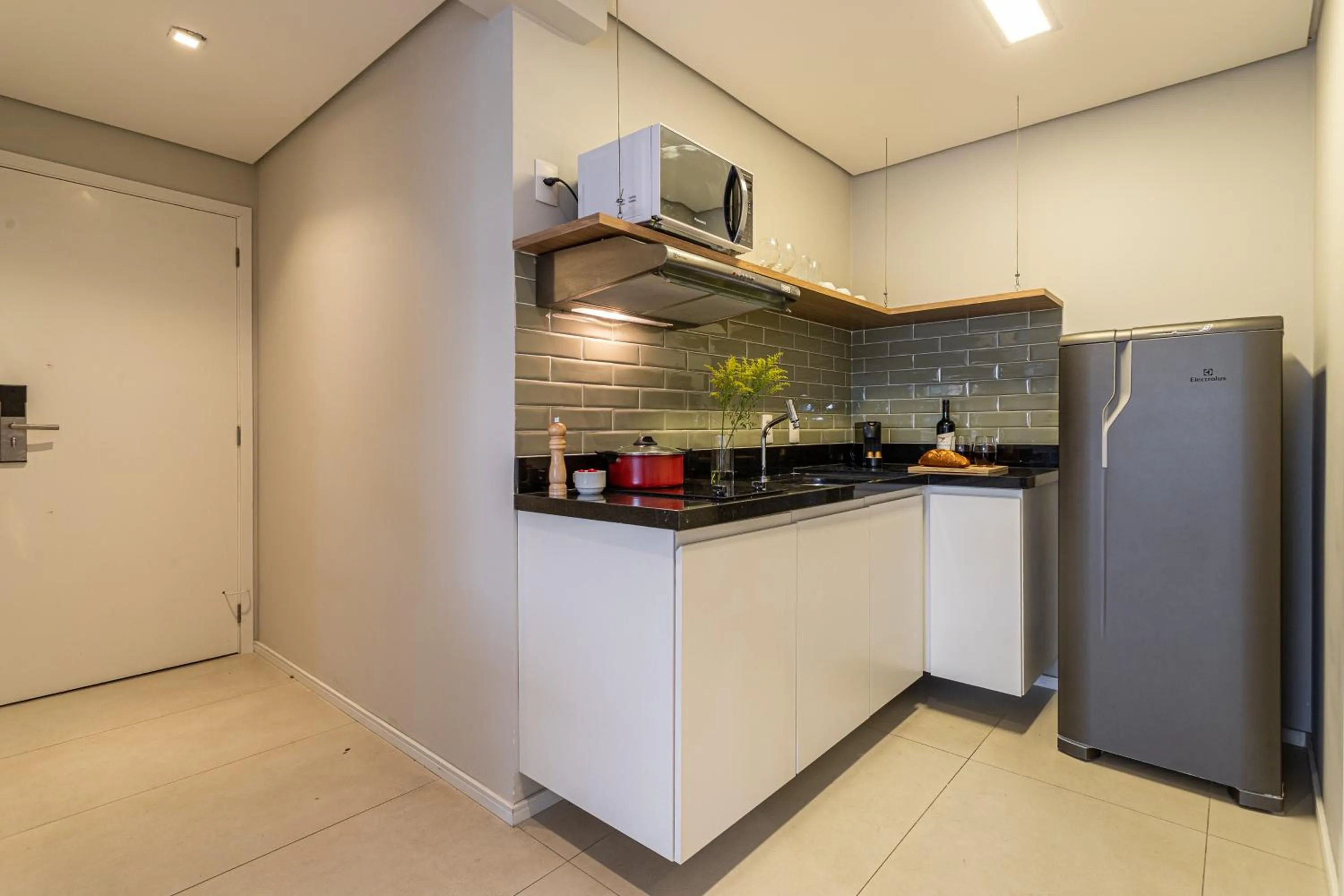 Kitchen or kitchenette in Next Home Design by Viva - Apartamentos em prédio próximo ao Parque do Ibirapuera