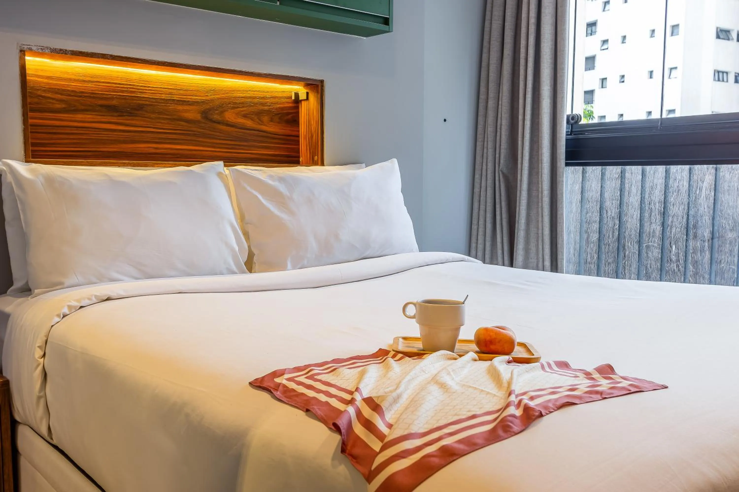 Bed in Next Home Design by Viva - Apartamentos em prédio próximo ao Parque do Ibirapuera