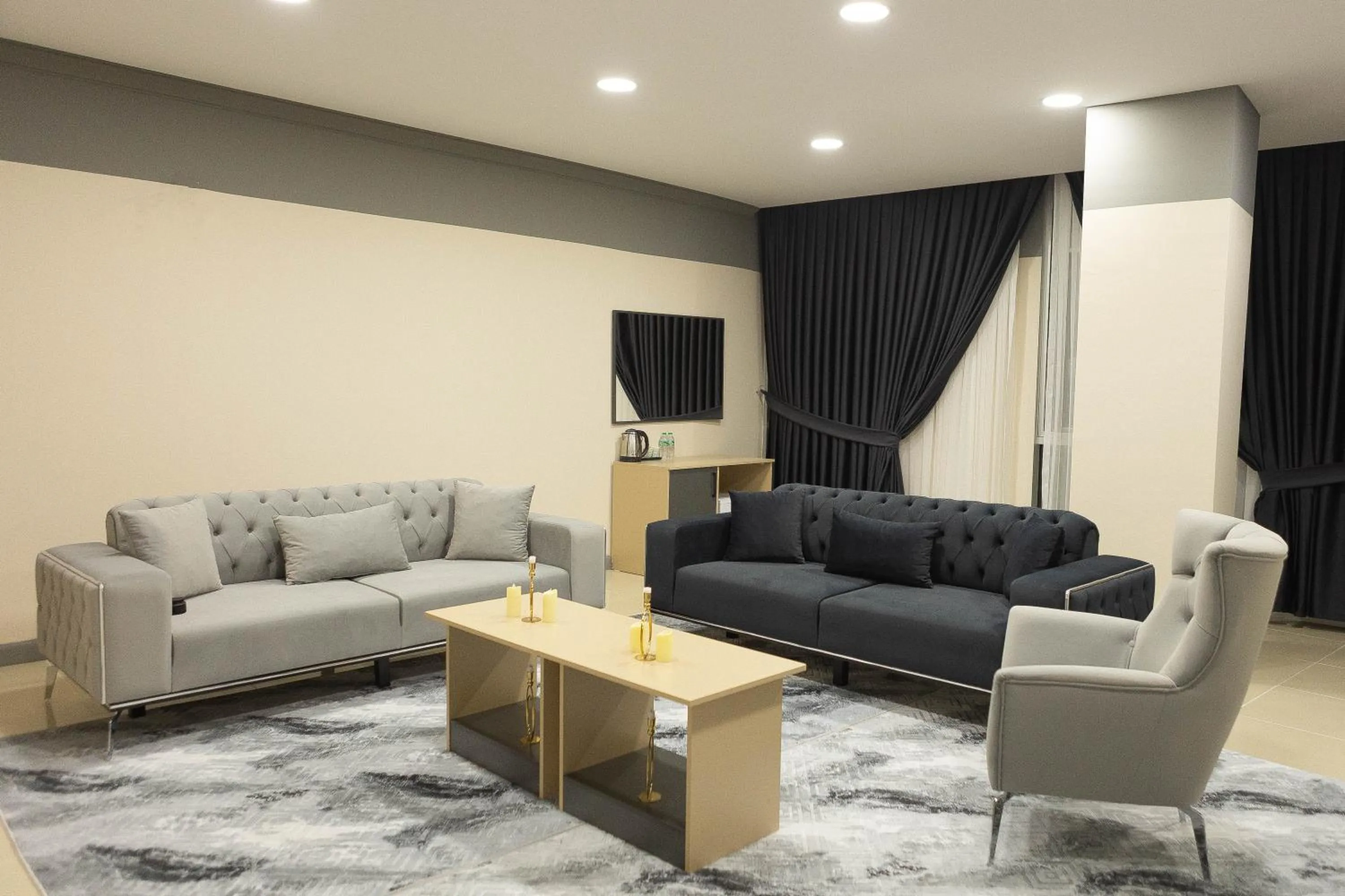Living room in City Night Suites & Hotels