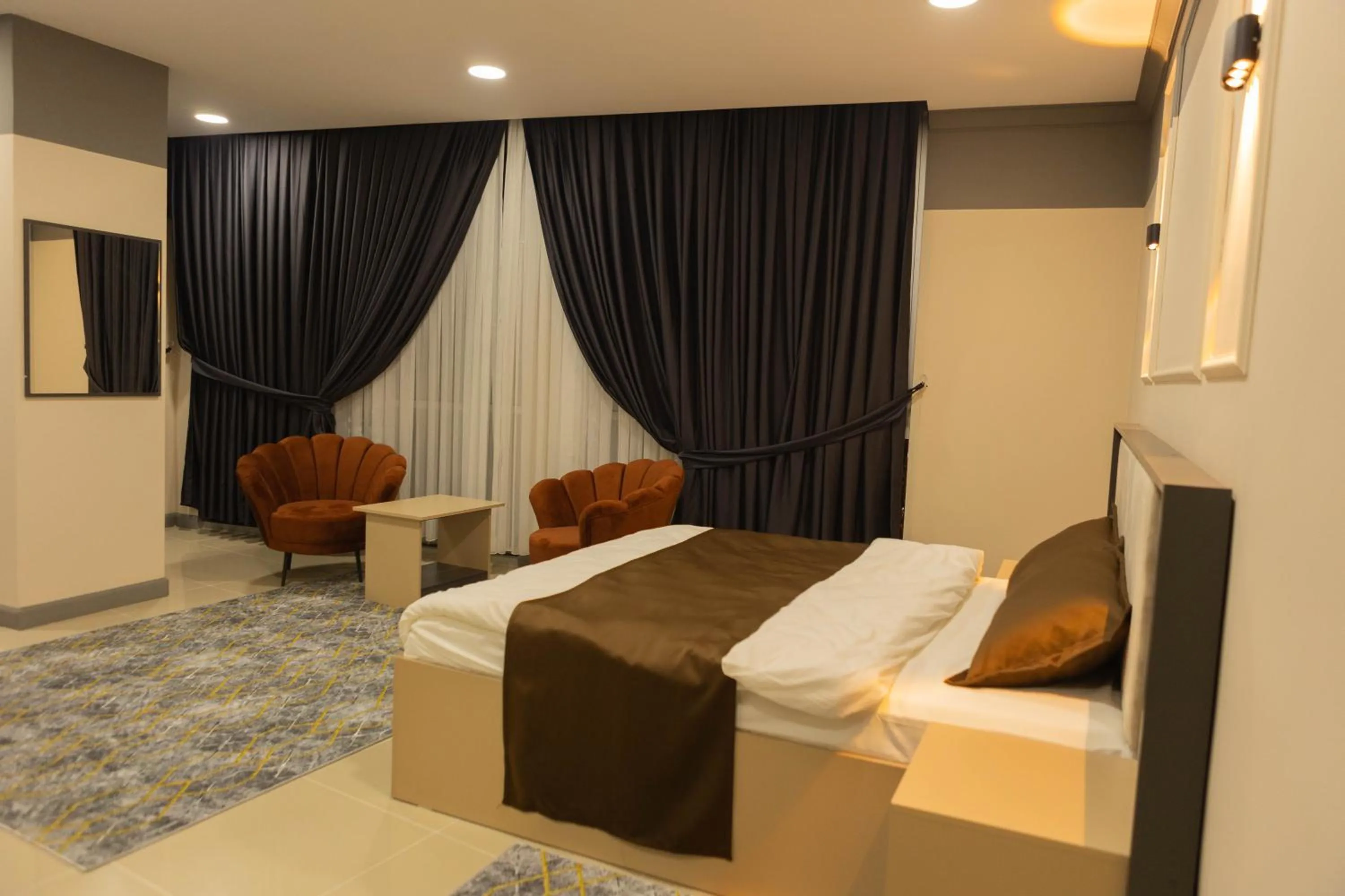 Photo of the whole room in City Night Suites & Hotels