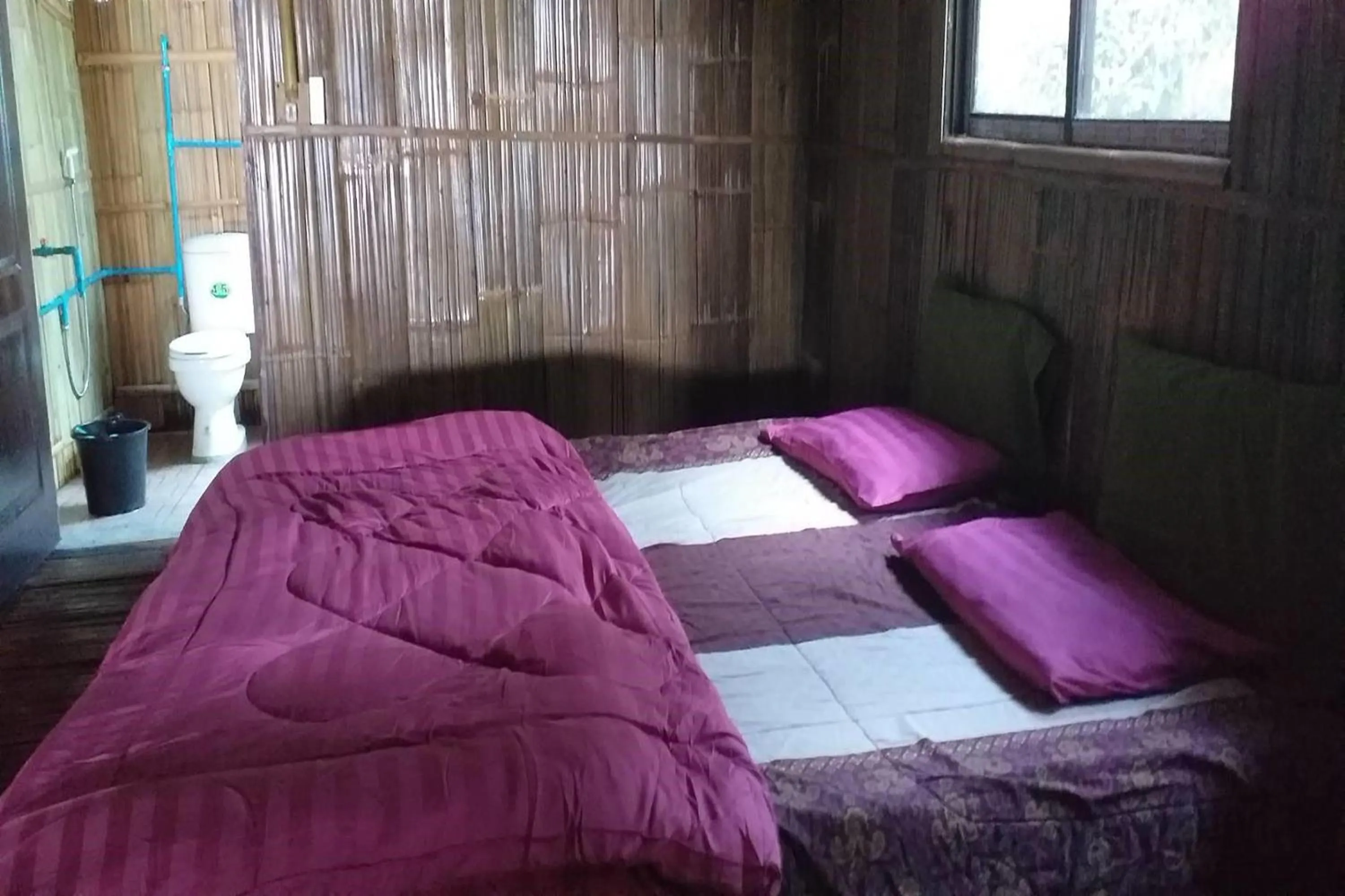 Bed in Doi PuMuen LAHU Homestay