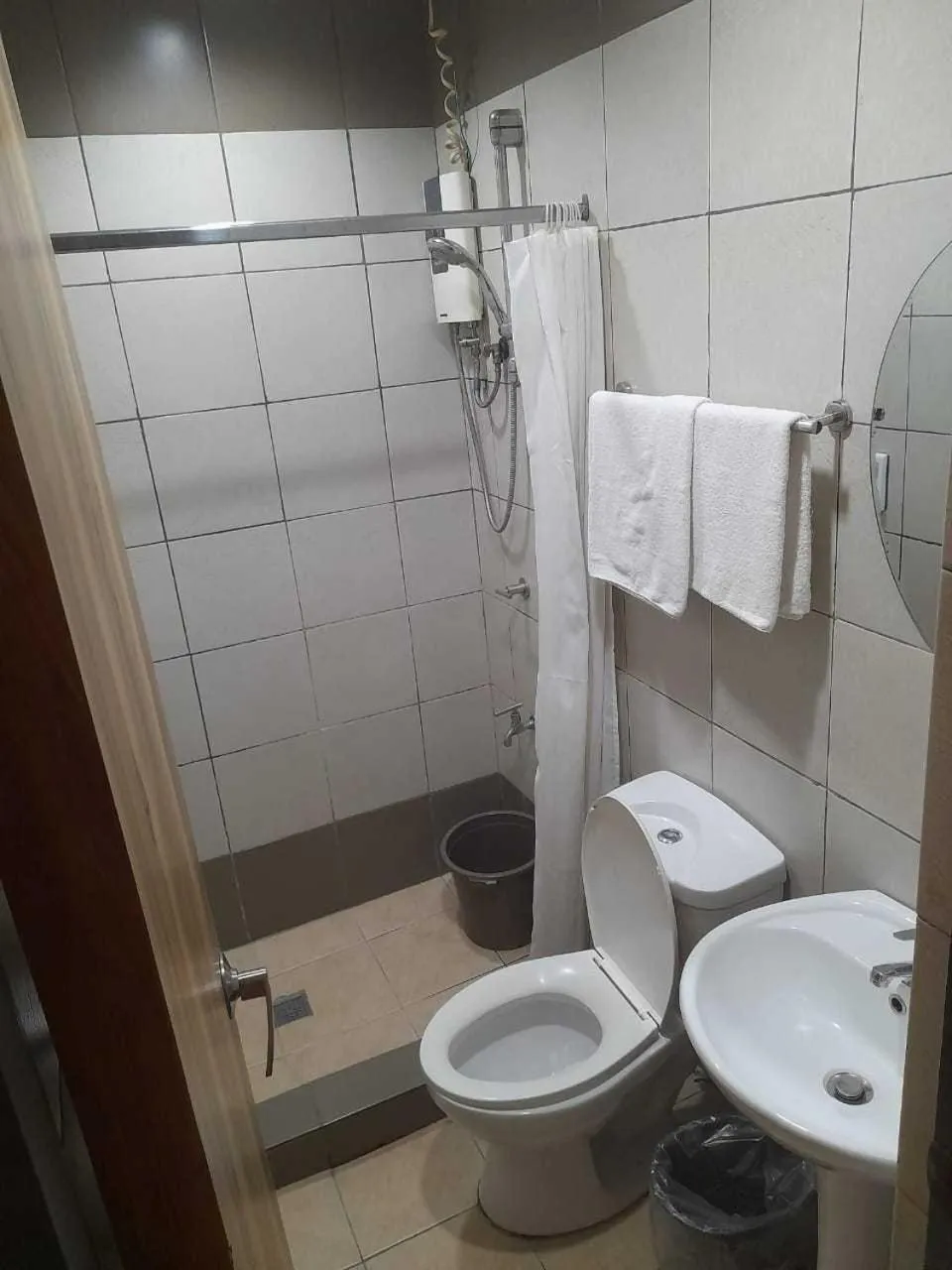 Bathroom in OYO 1011 First Hotel