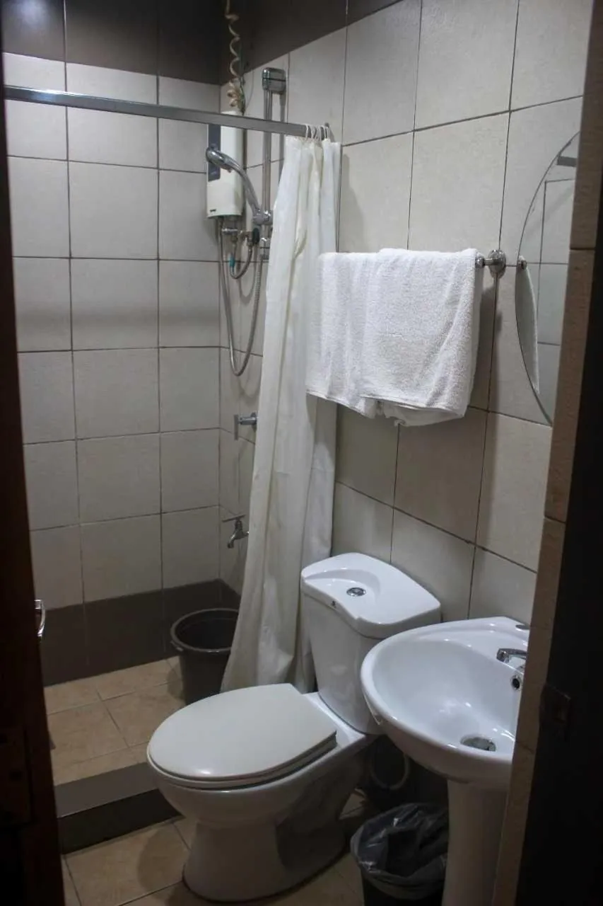 Bathroom in OYO 1011 First Hotel