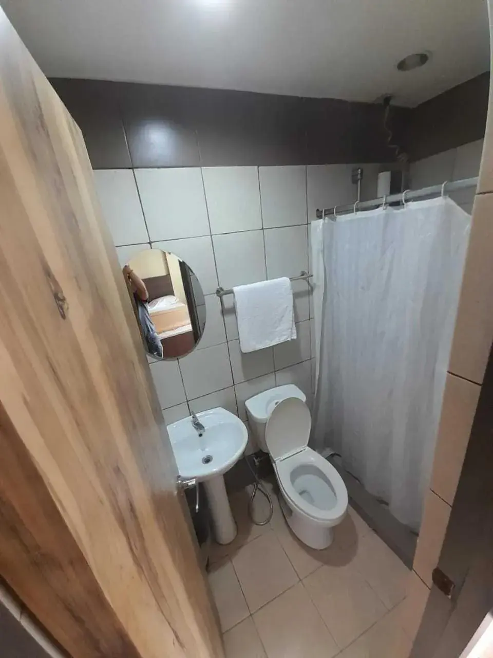 Bathroom in OYO 1011 First Hotel Bathroom in OYO 1011 First Hotel