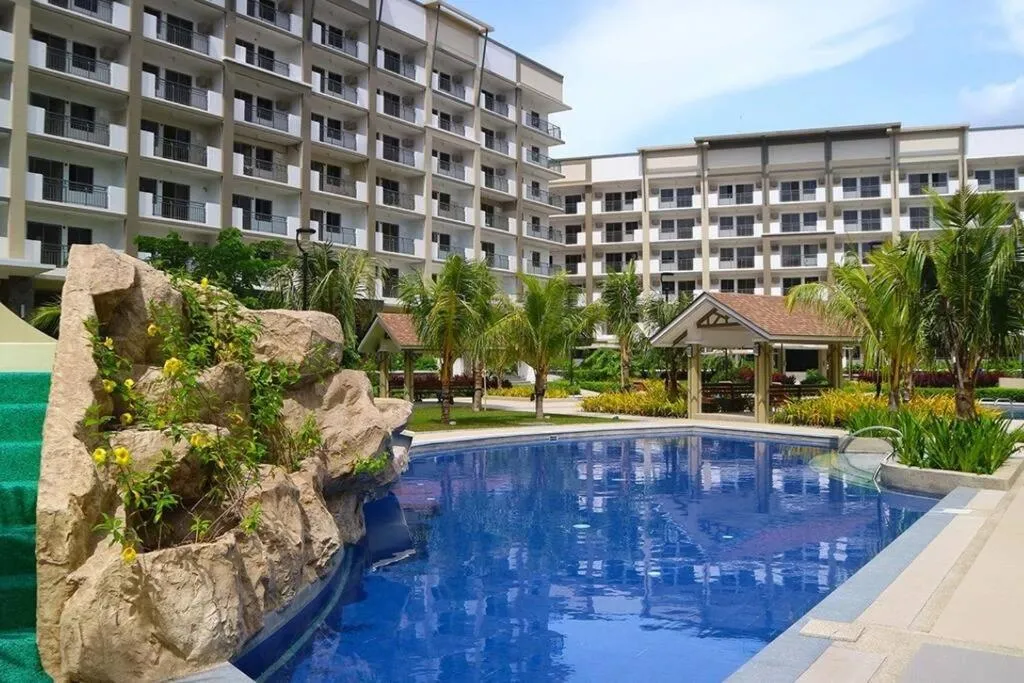 Swimming pool in Bohemian Inspired 2 Bedroom Inspired Condo with Fast WIFI Near BGC