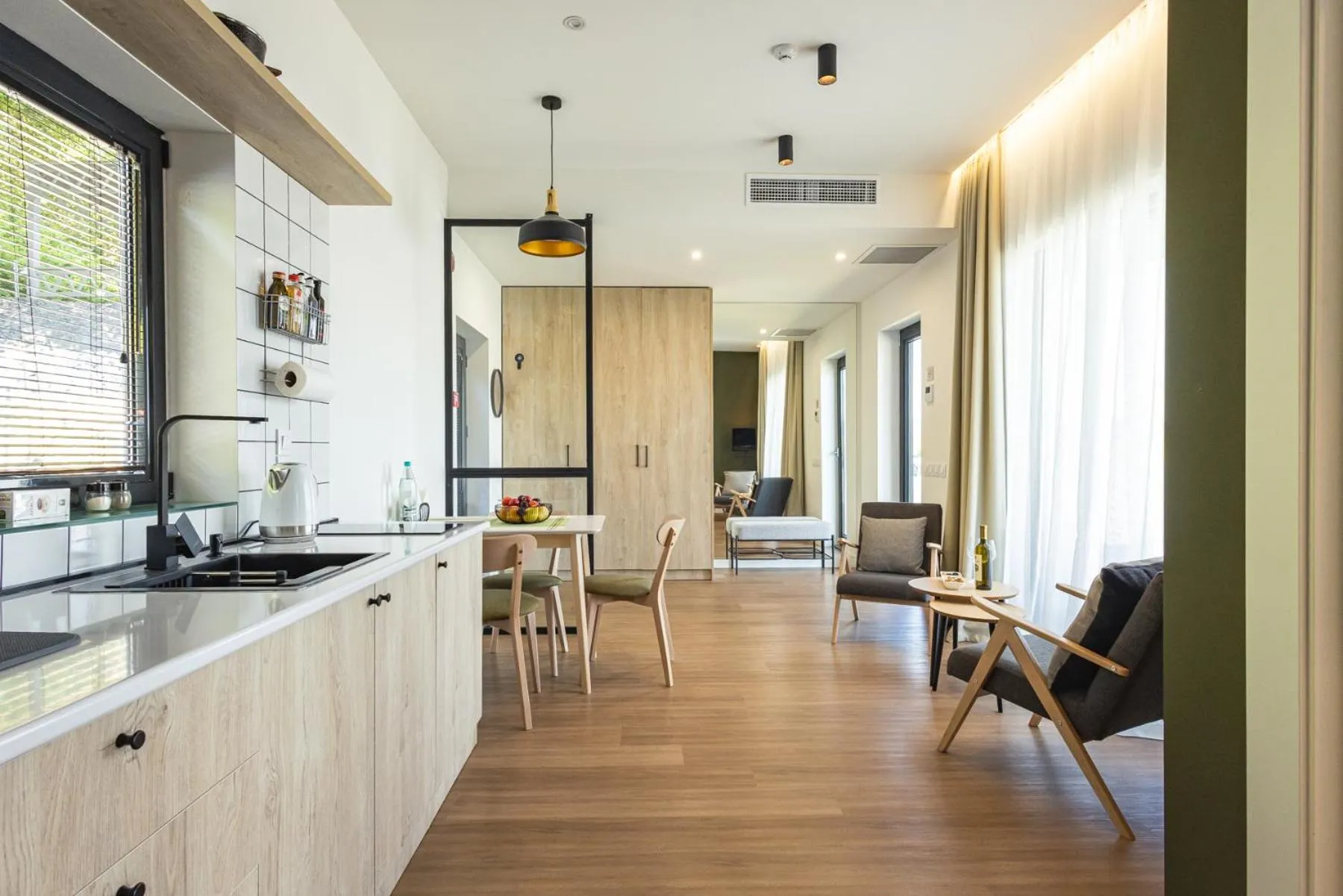 Kitchen or kitchenette in Apart Hotel Kundzuli