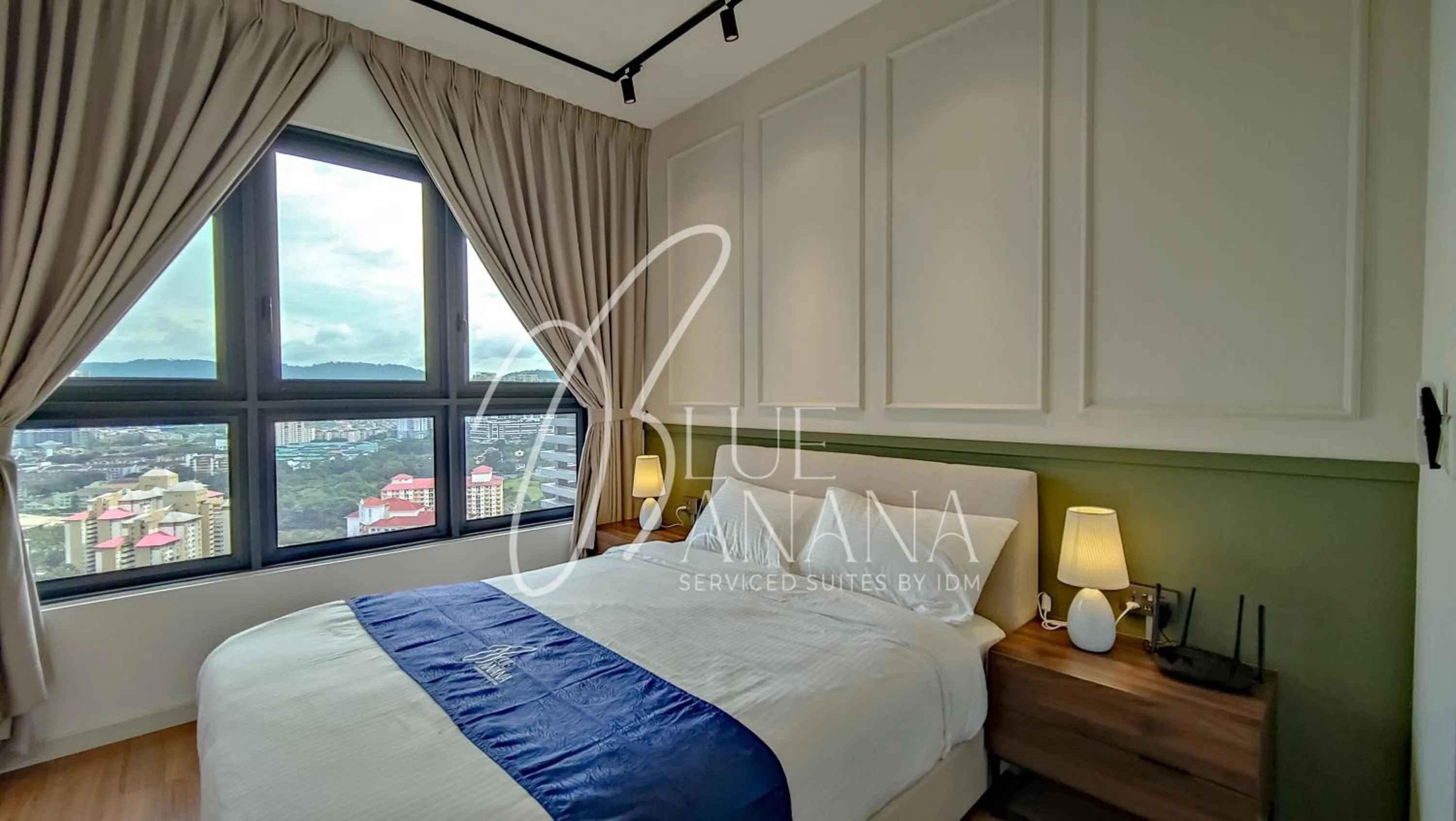 Bed in M Vertica Premier Suites by BlueBanana