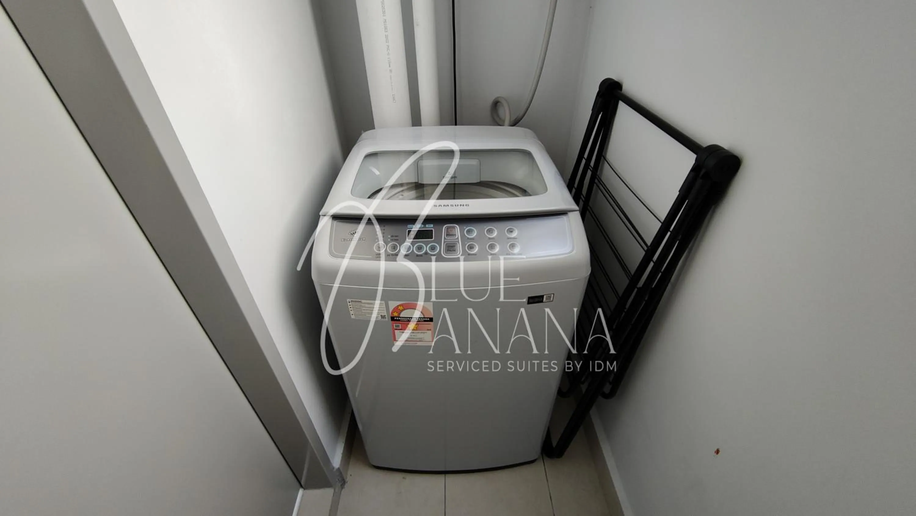 washing machine in M Vertica Premier Suites by BlueBanana