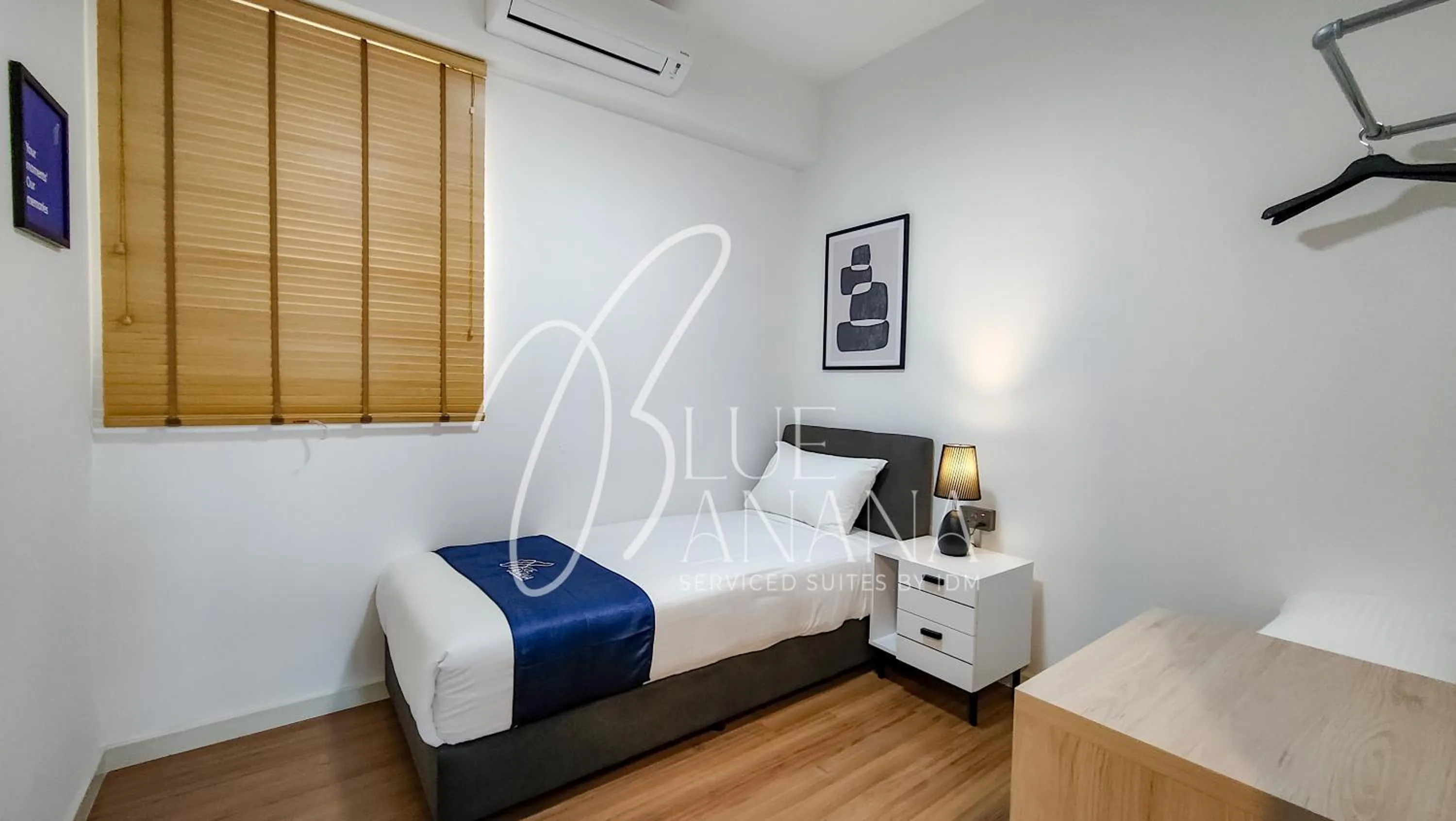 Bed in M Vertica Premier Suites by BlueBanana