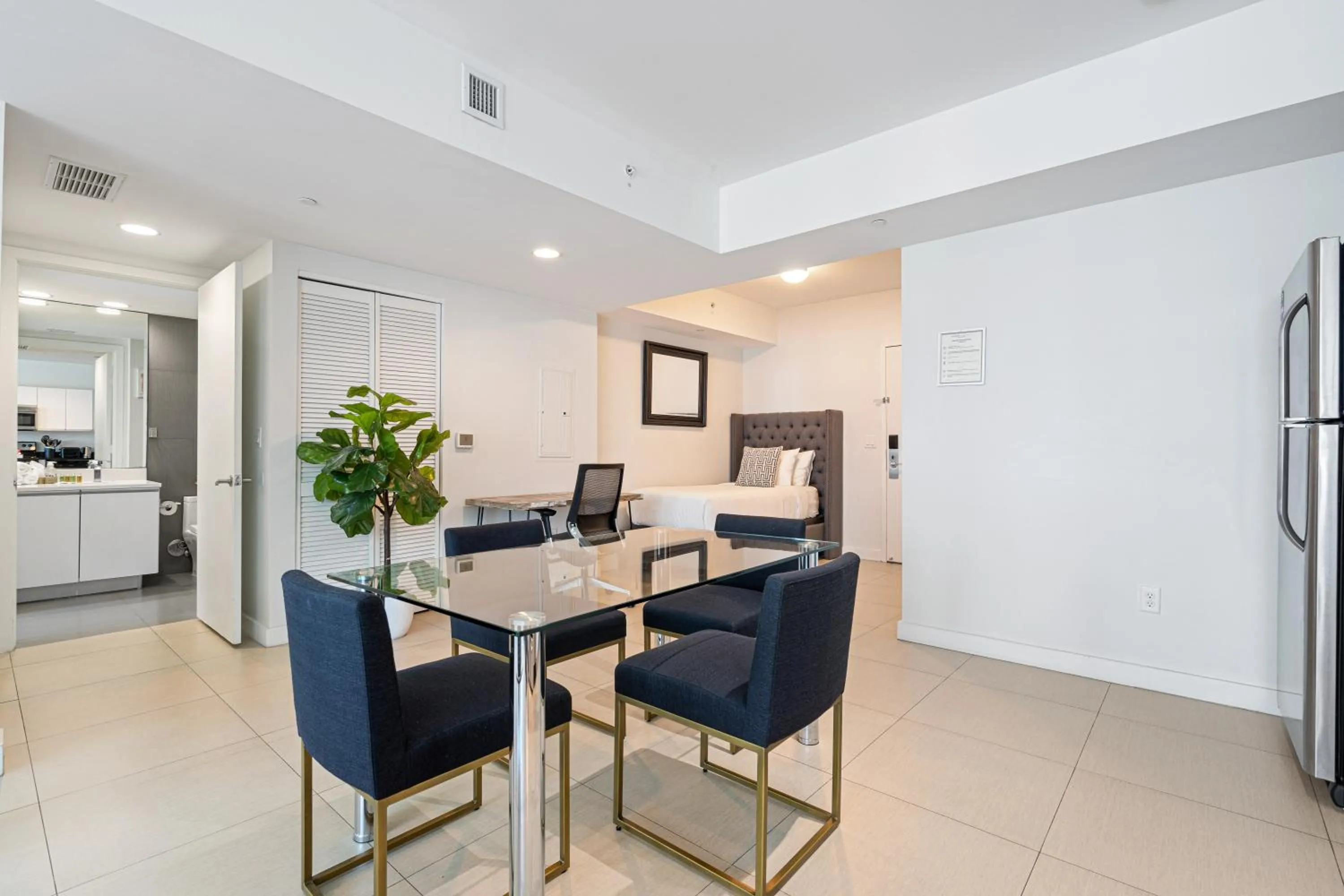 Dining area in Dharma Home Suites Miami Beach at Monte Carlo