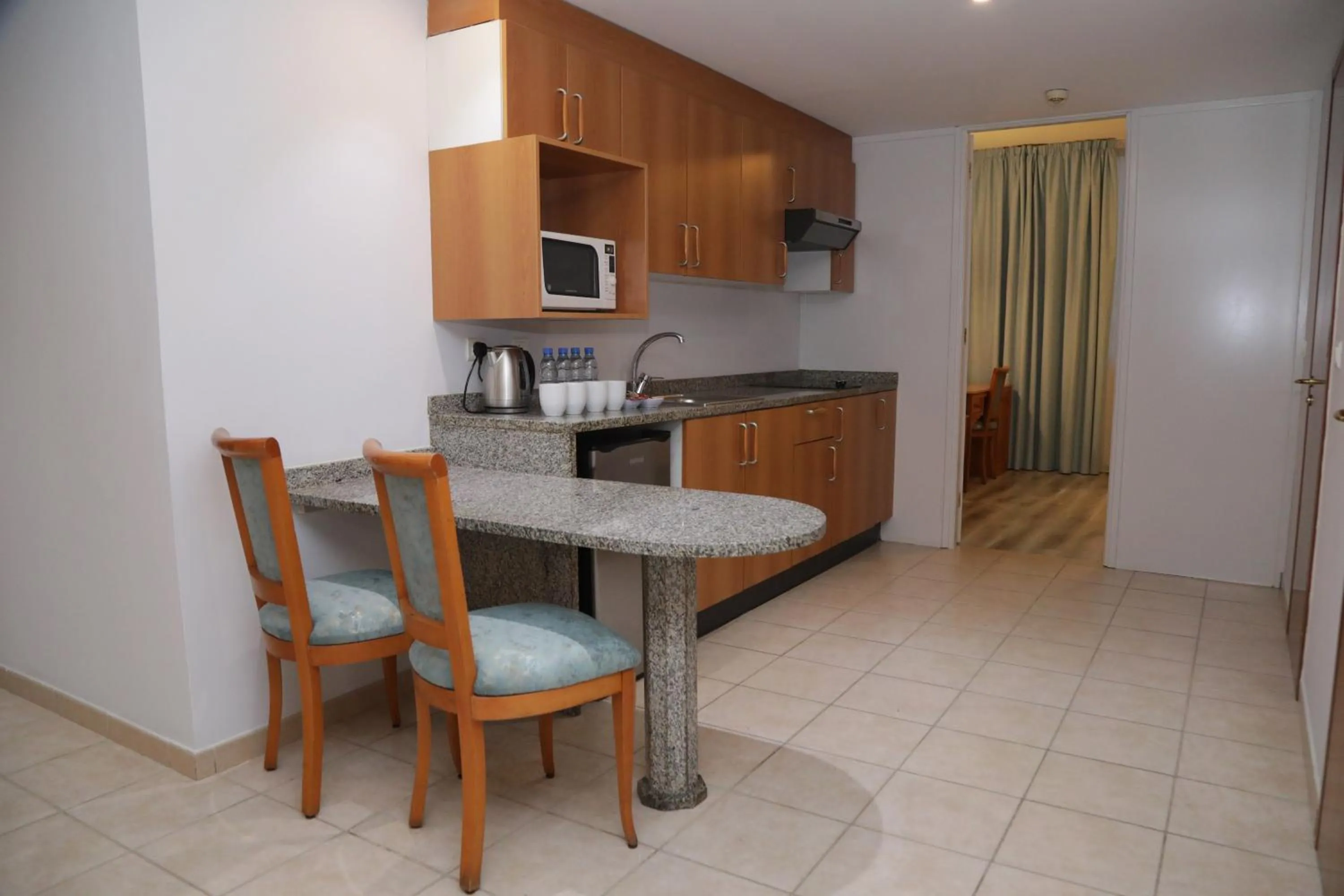 Kitchen or kitchenette in El Sheikh Suites Hotel