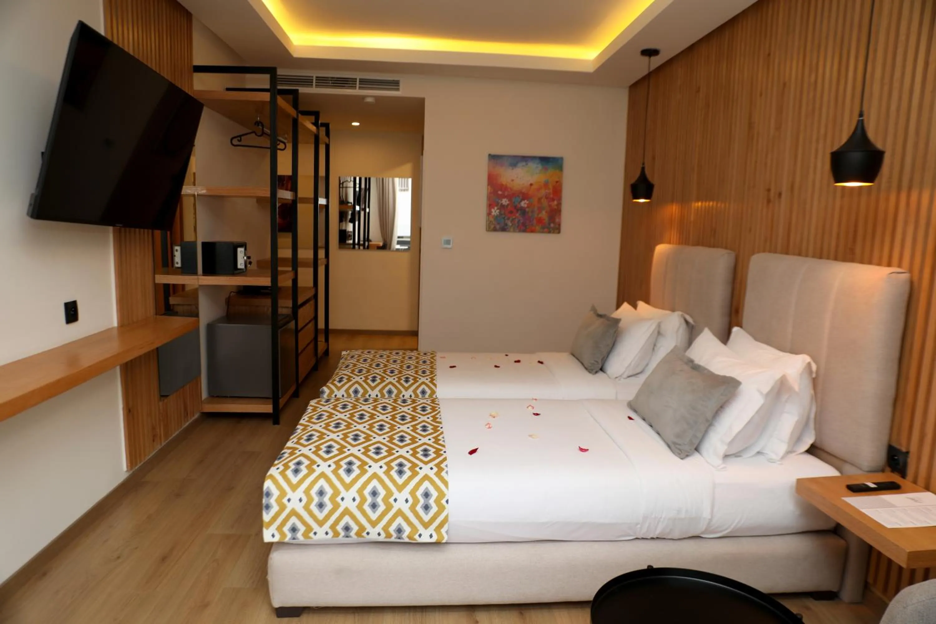 Communal lounge/ TV room, Bed in Unico Hotel & Spa Casablanca