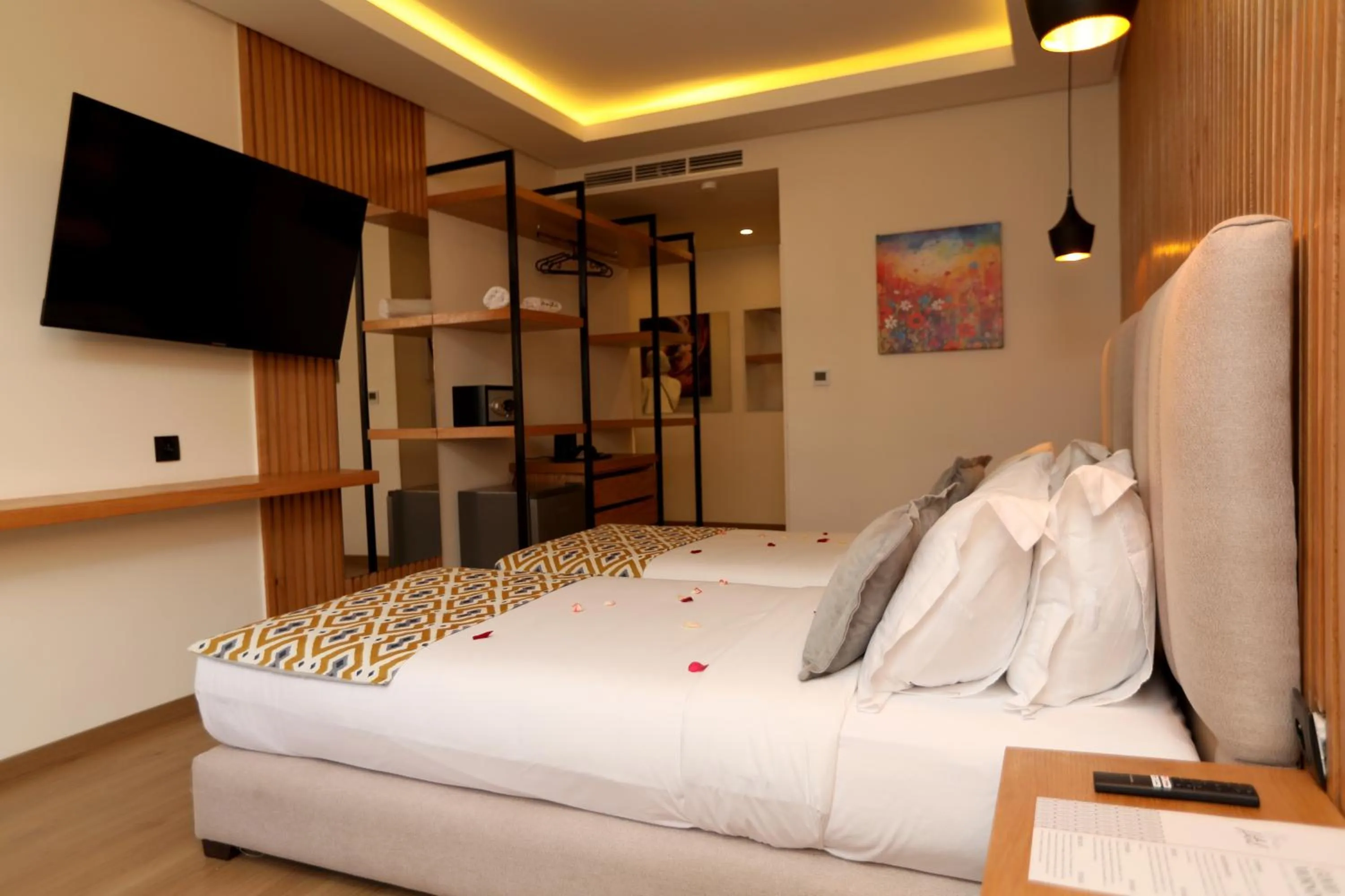 Communal lounge/ TV room, Bed in Unico Hotel & Spa Casablanca