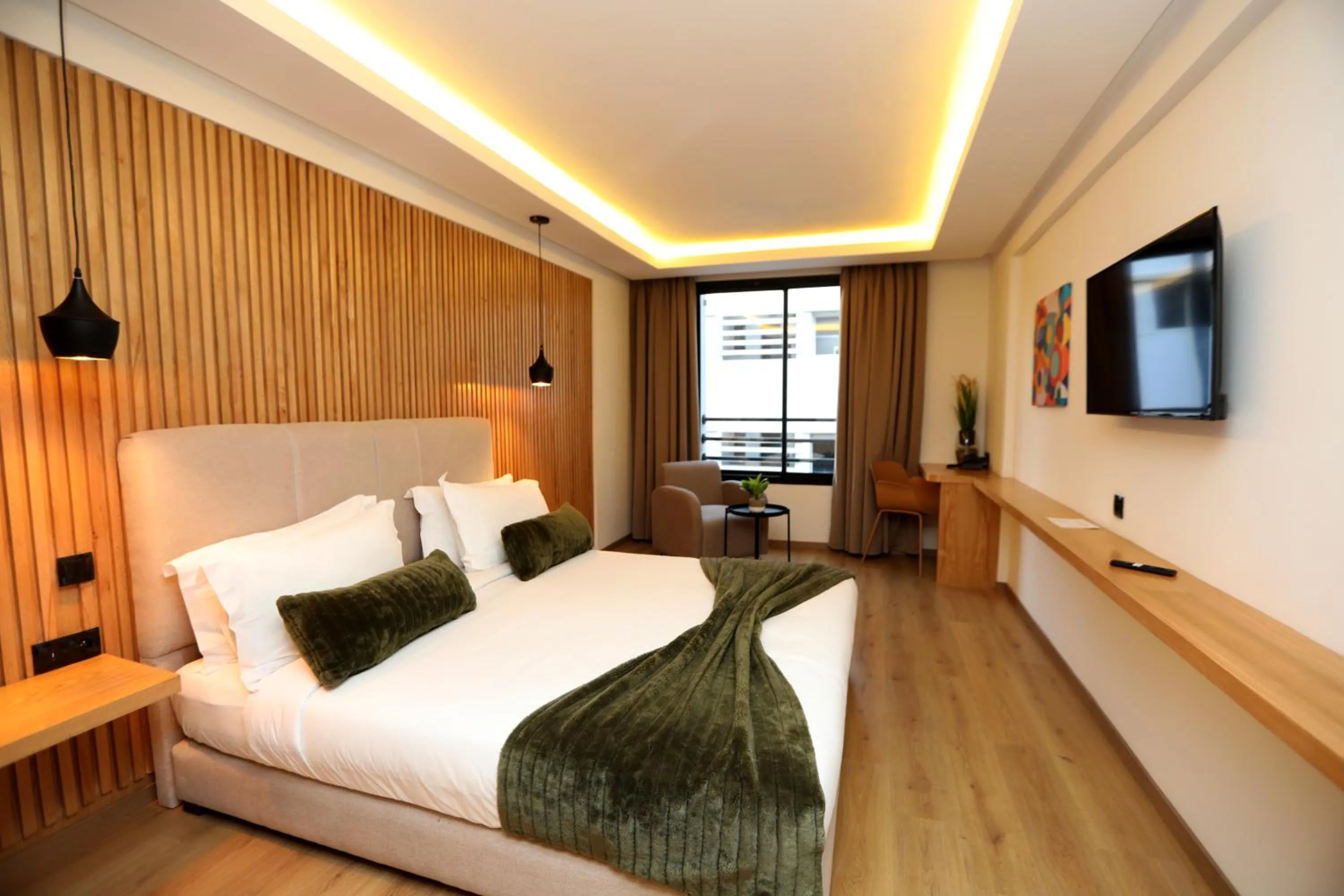 Communal lounge/ TV room, Bed in Unico Hotel & Spa Casablanca