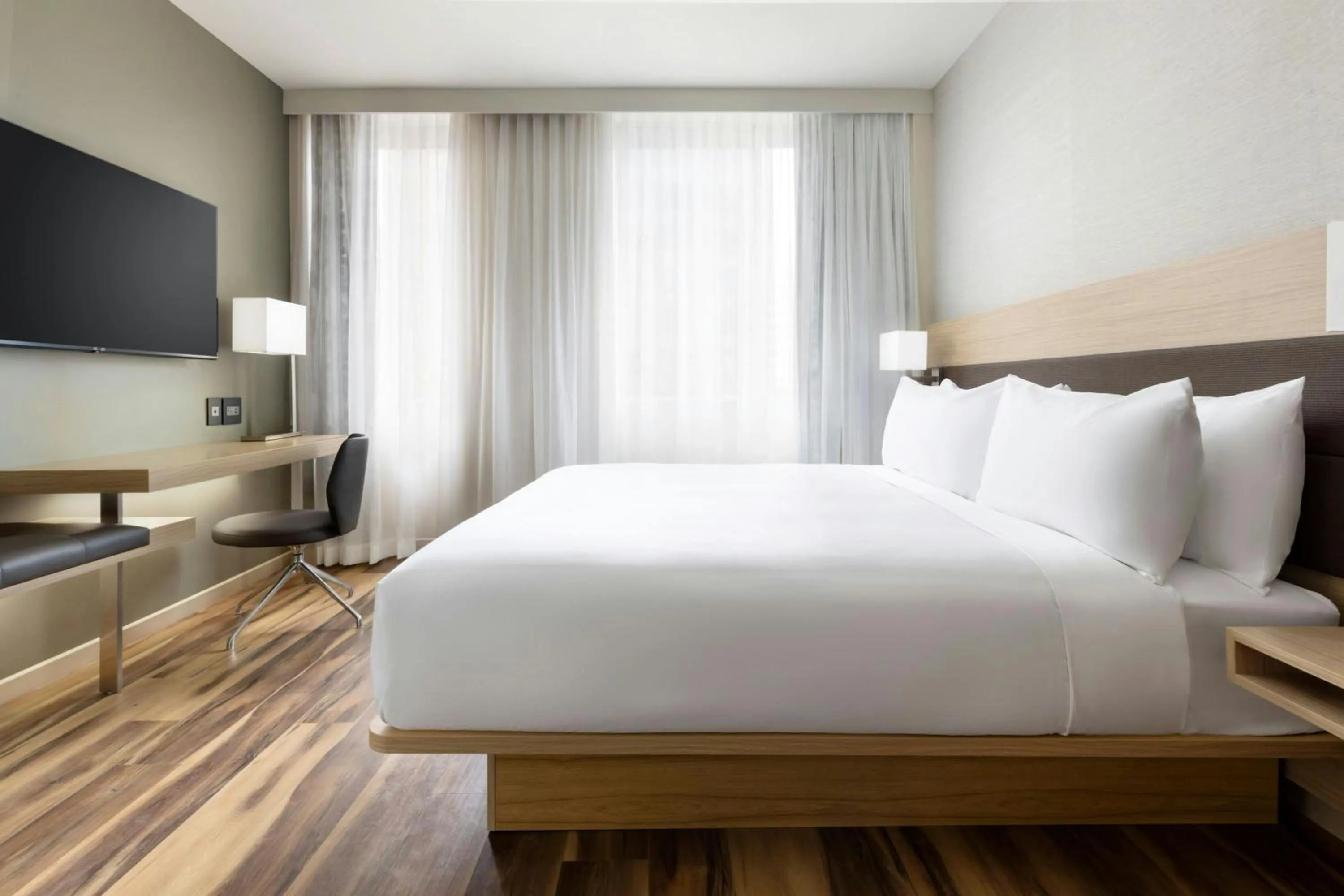 Photo of the whole room, Bed in AC Hotel by Marriott Honolulu