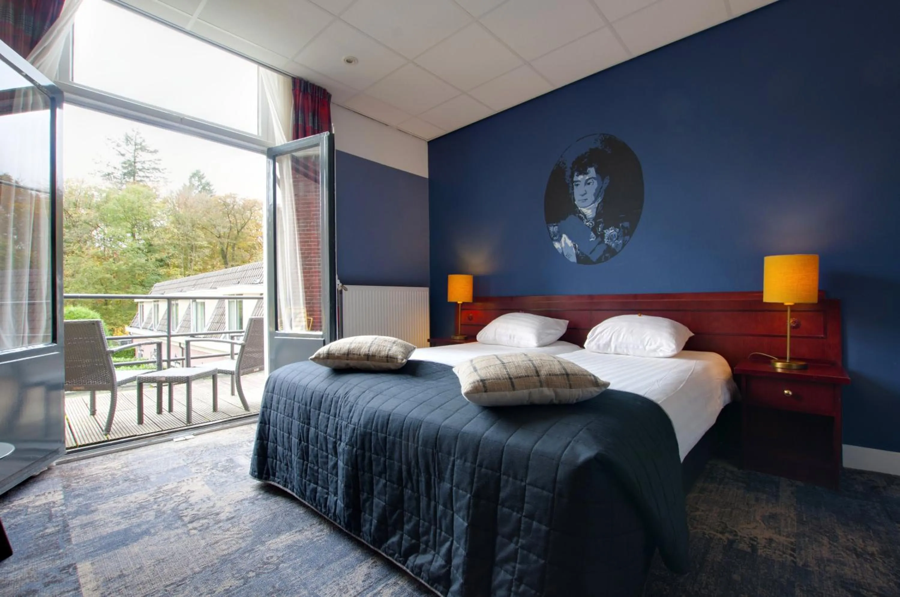 Balcony/Terrace, Bed in Boetiek Hotel BonAparte Lochem