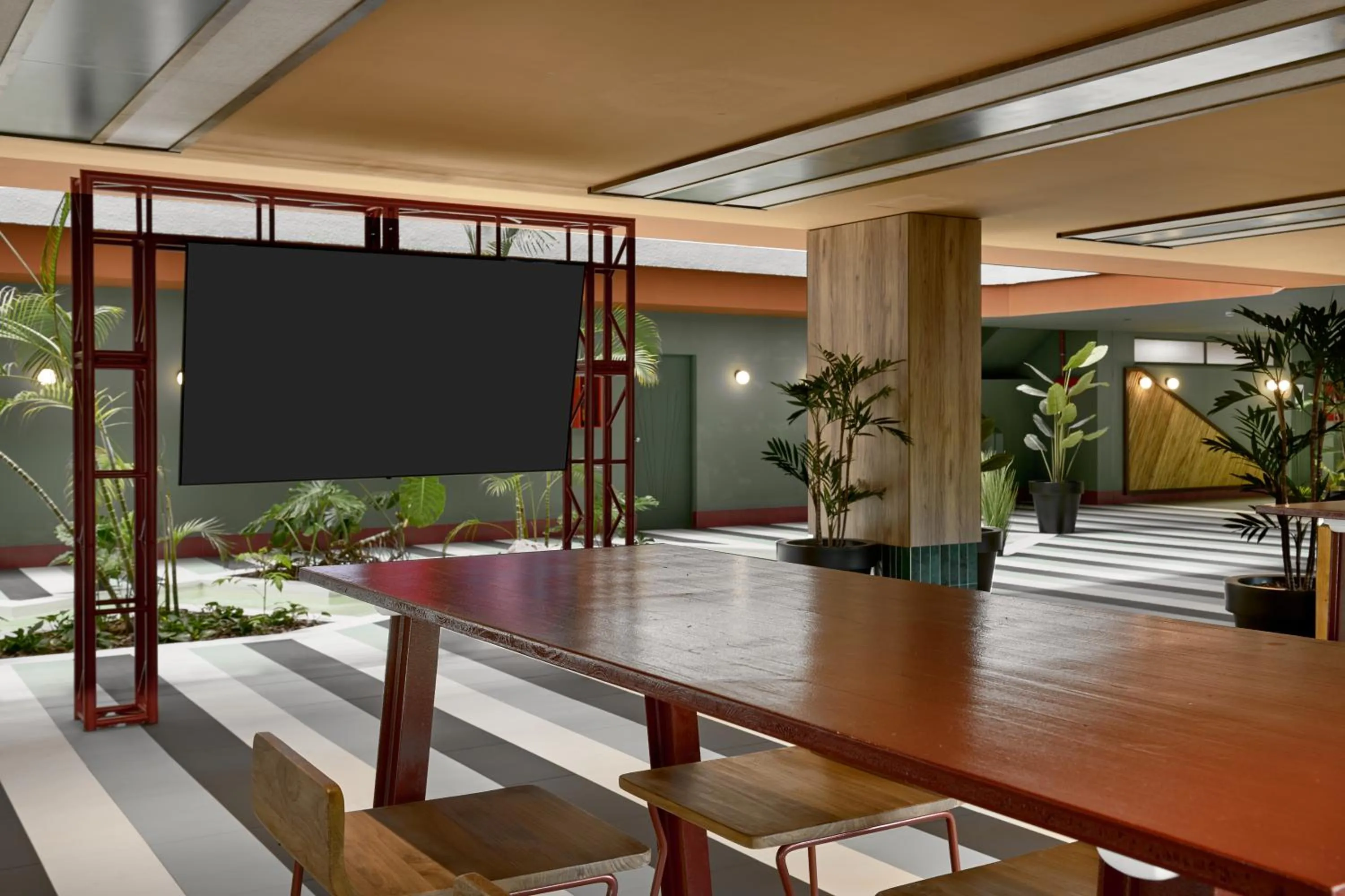 Communal lounge/ TV room in tent Mojito Suites