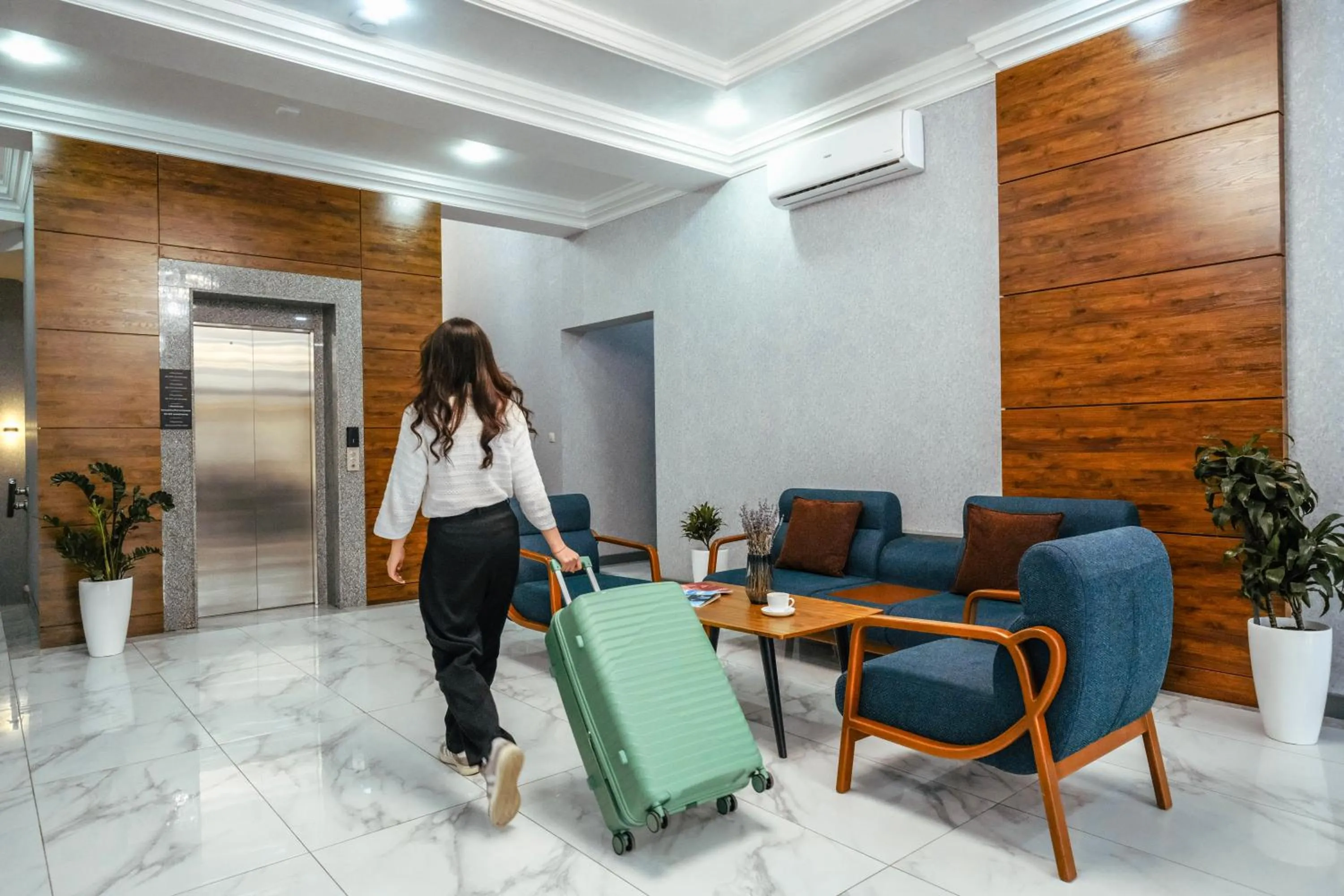 Communal lounge/ TV room in Parklane Hotel