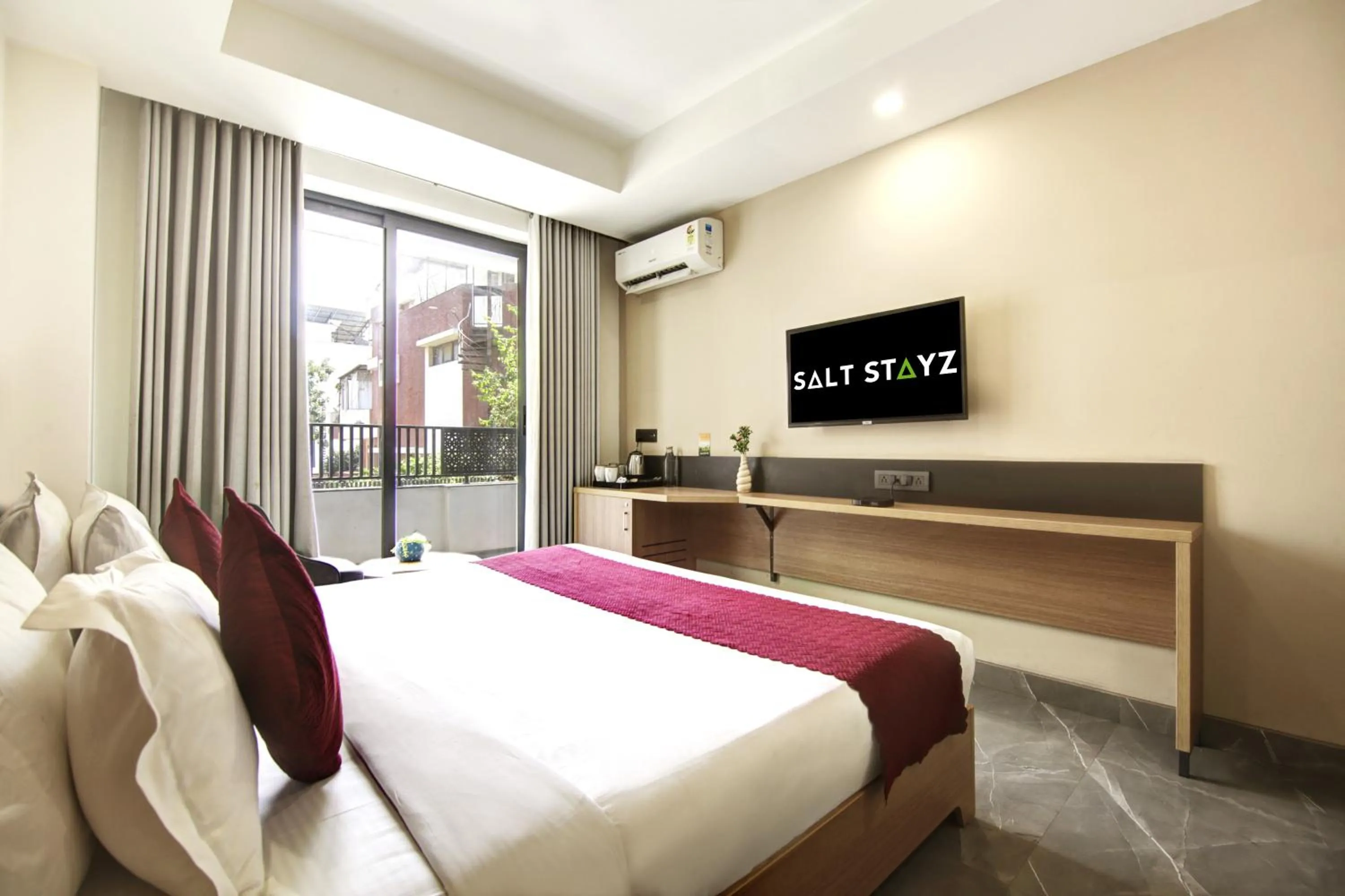 Communal lounge/ TV room, Bed in Saltstayz Premier - Cyber Hub