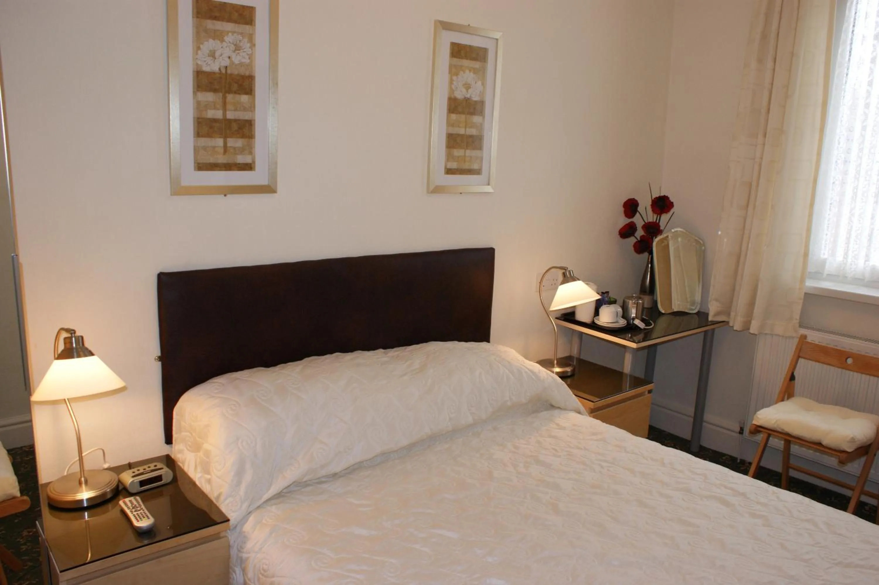 Bed in Beachcomber Hotel