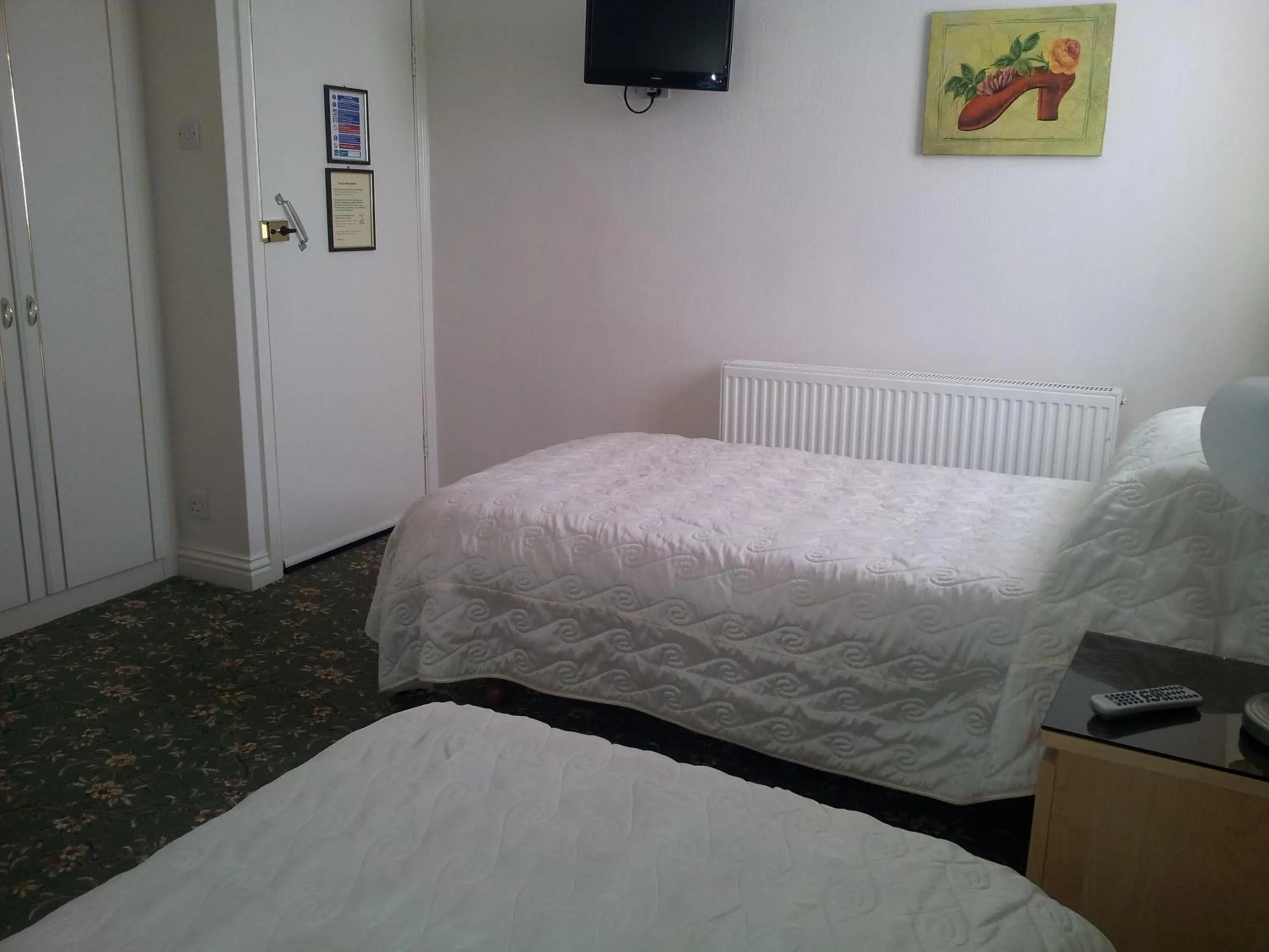 Bed in Beachcomber Hotel