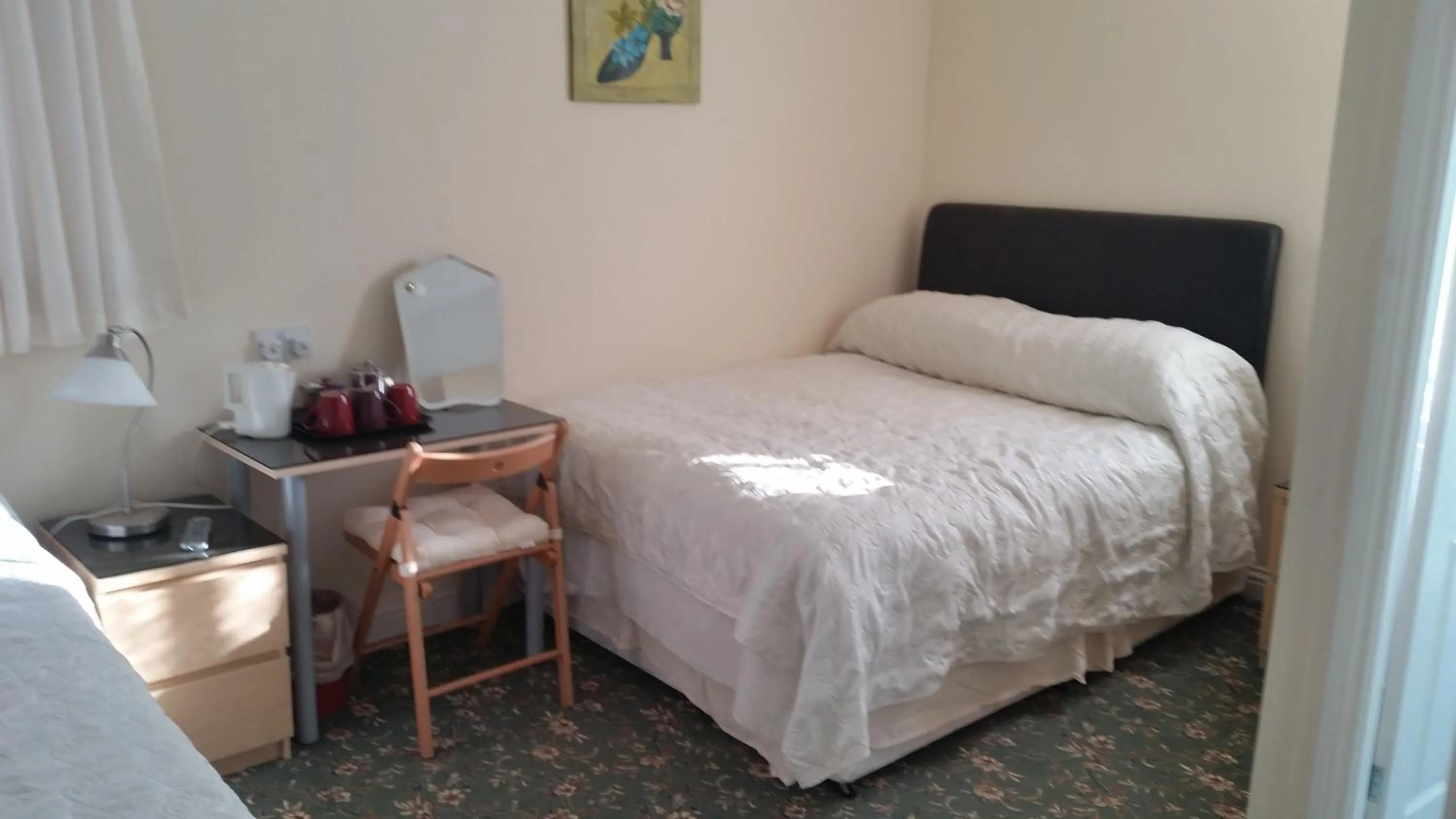 Bed in Beachcomber Hotel