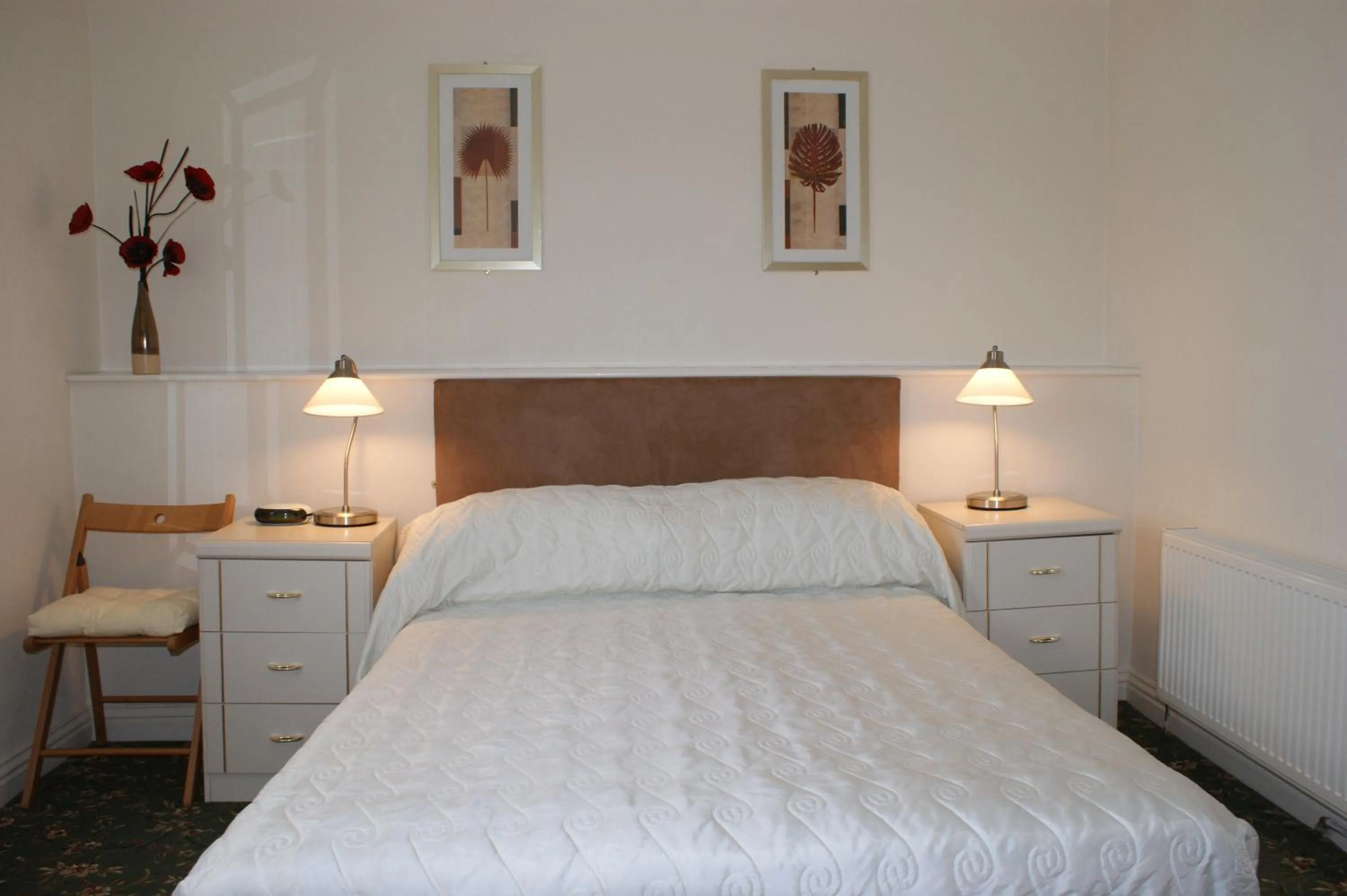 Bed in Beachcomber Hotel