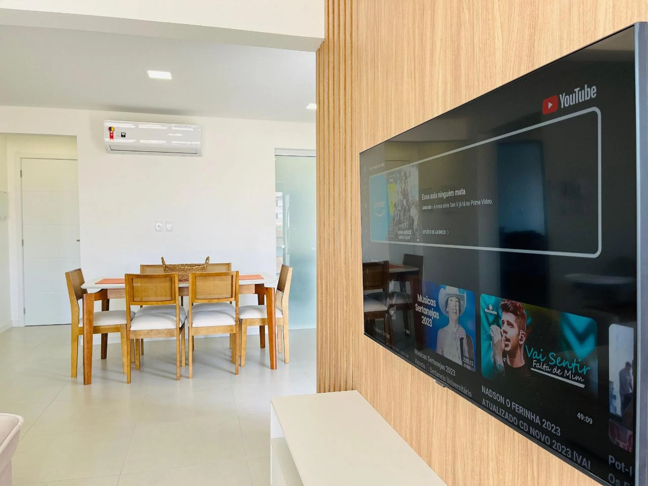 Living room in Incrível apartamento à 200m da praia