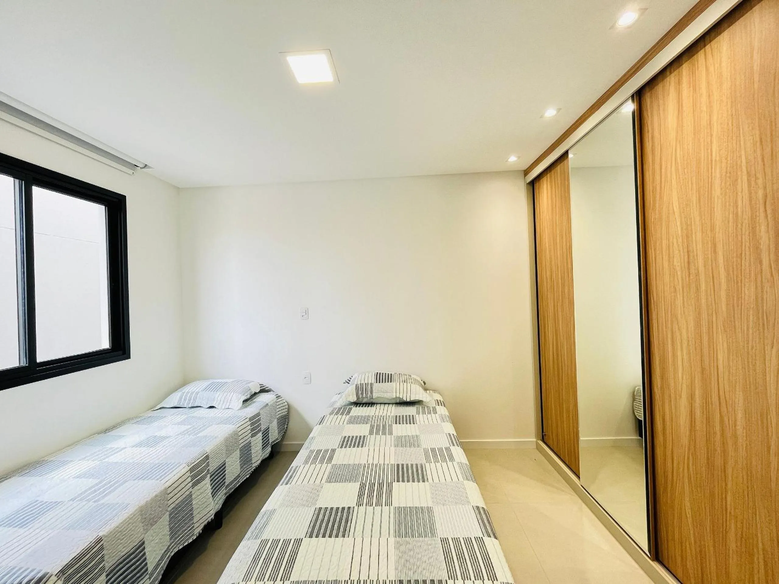 Photo of the whole room, Bed in Incrível apartamento à 200m da praia