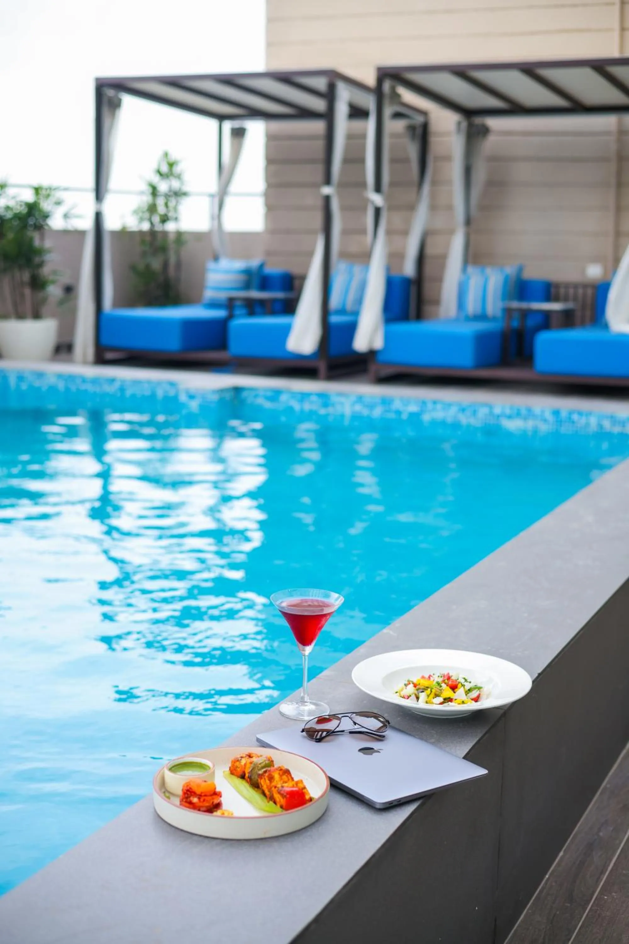 Swimming pool in Rhythm Gurugram Hotel & Suites, Sohna Road