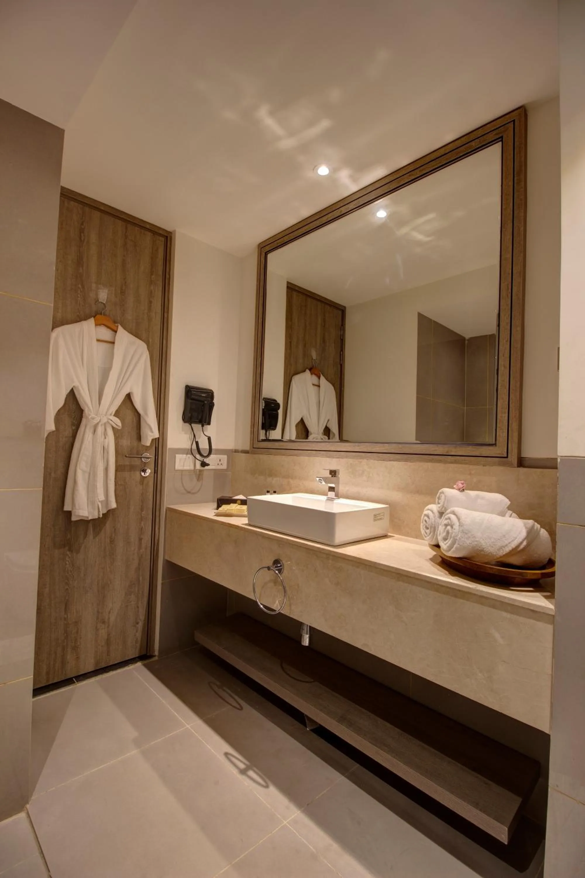 Bathroom in Rhythm Gurugram Hotel & Suites, Sohna Road