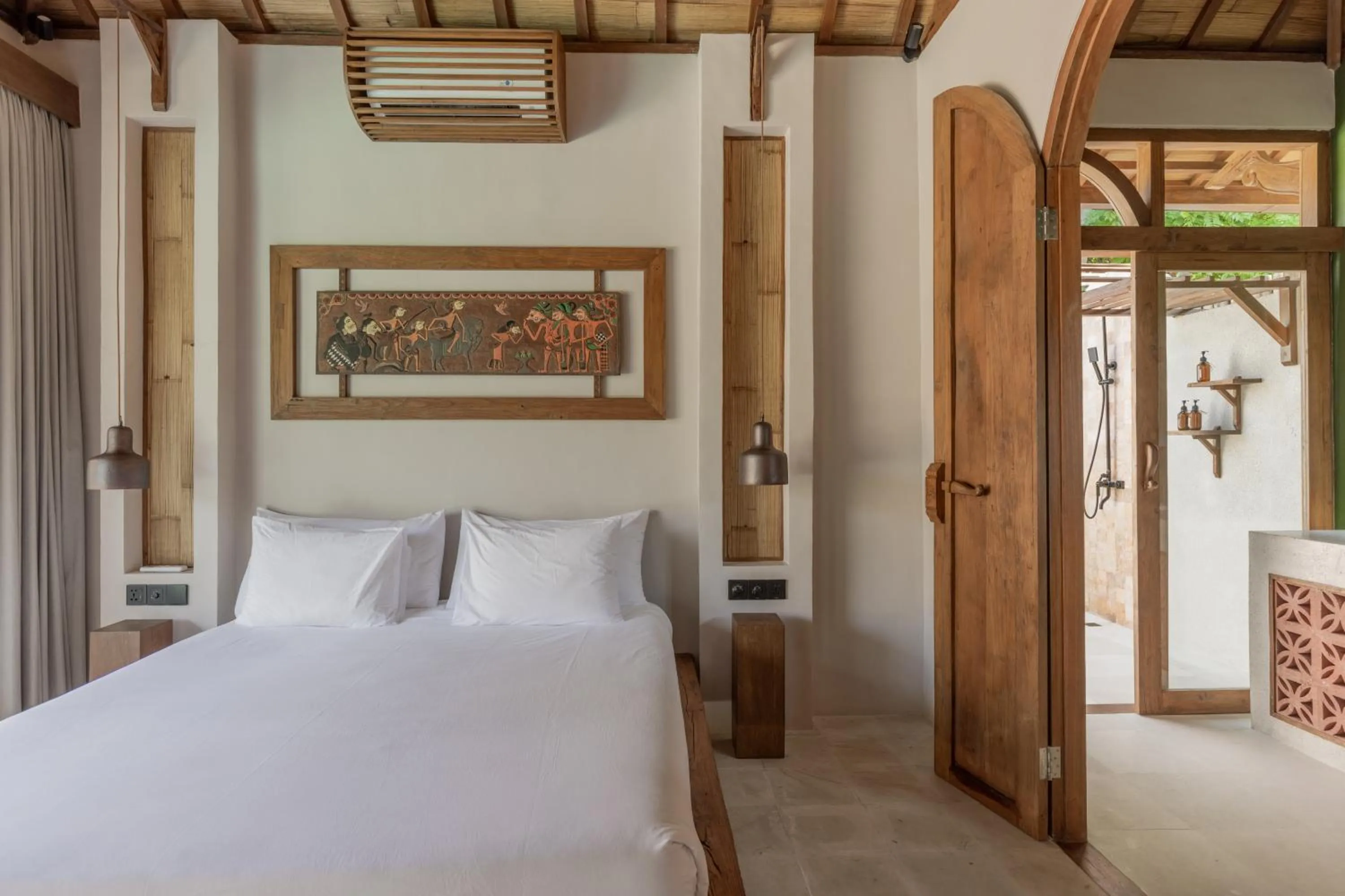 Bed in Kalyana Villa Gili Air