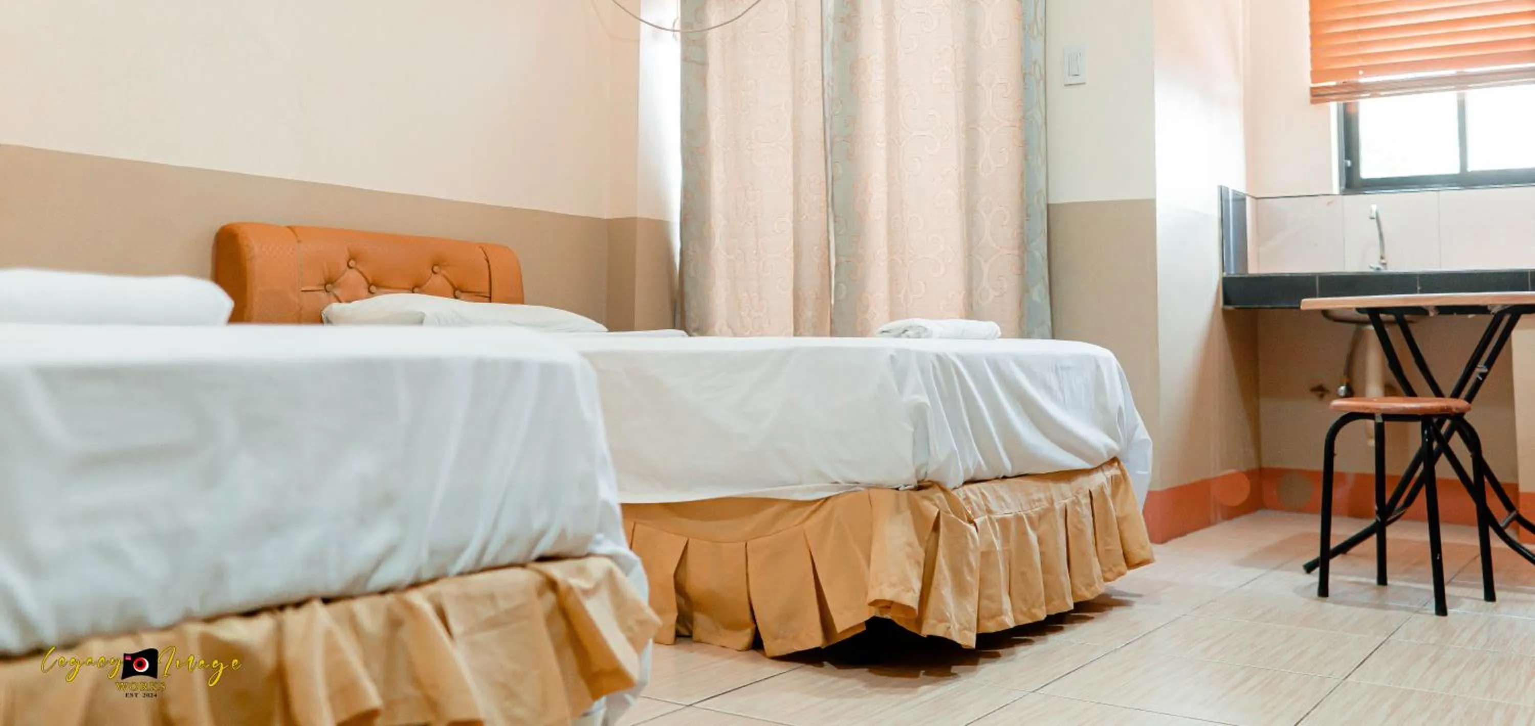 Bed in Imperial Ridge Pension House