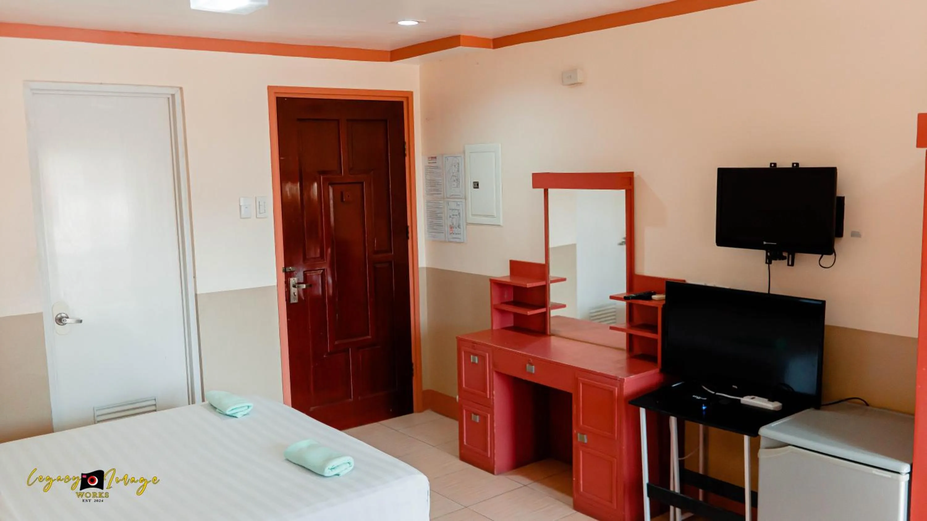 Bed in Imperial Ridge Pension House