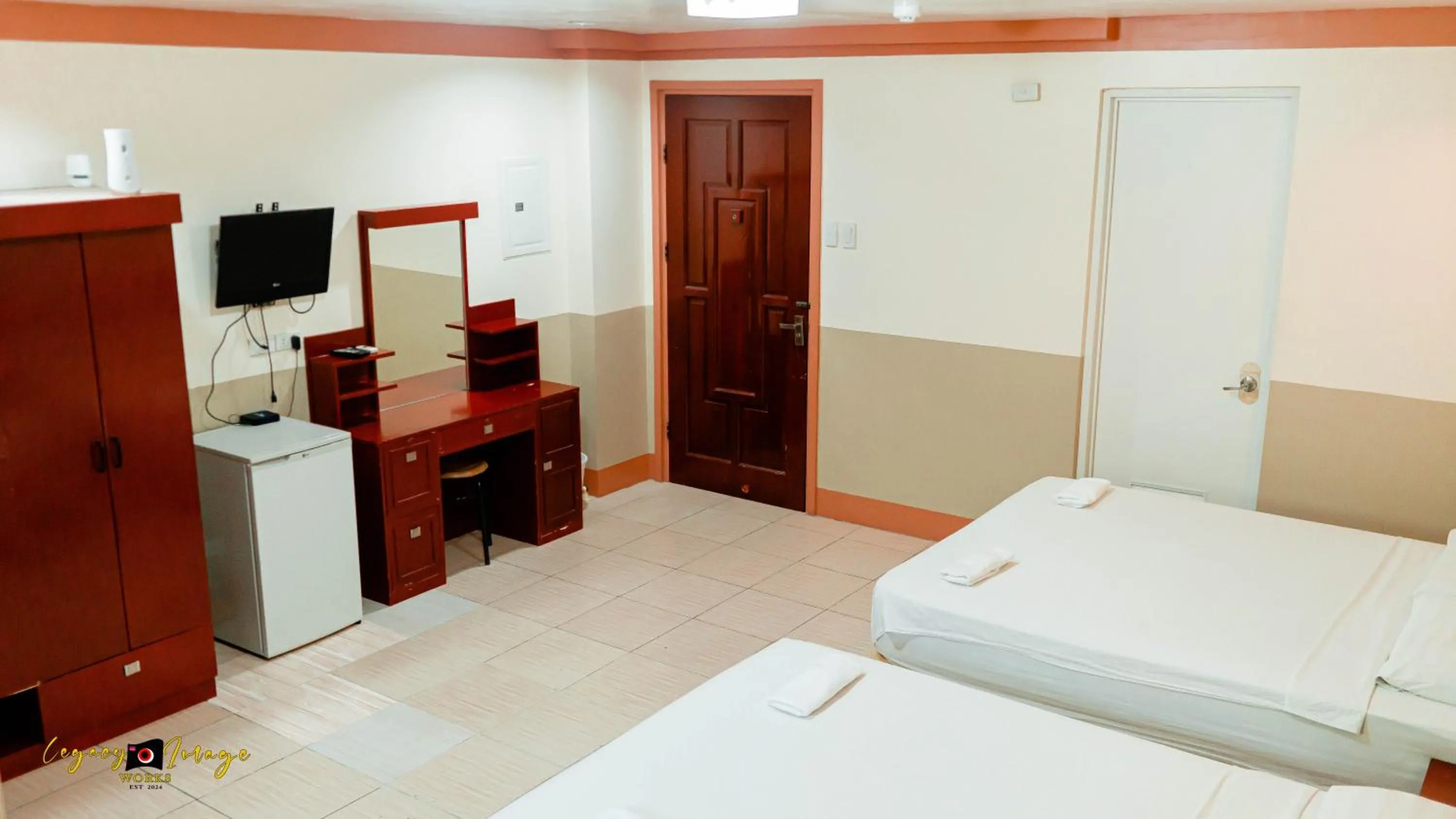 Bed in Imperial Ridge Pension House