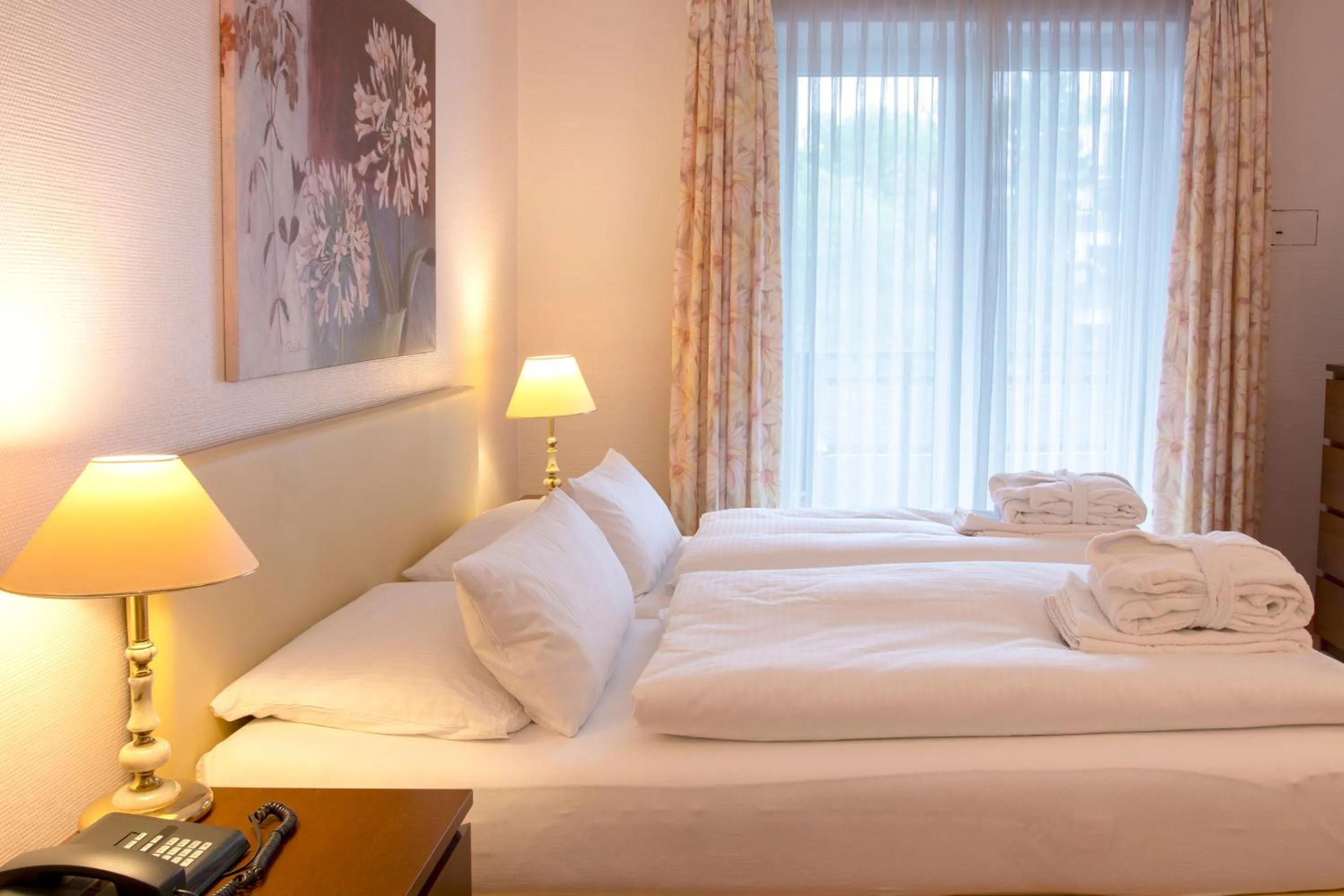 Photo of the whole room, Bed in Golf- und Wellnesshotel Amtsheide