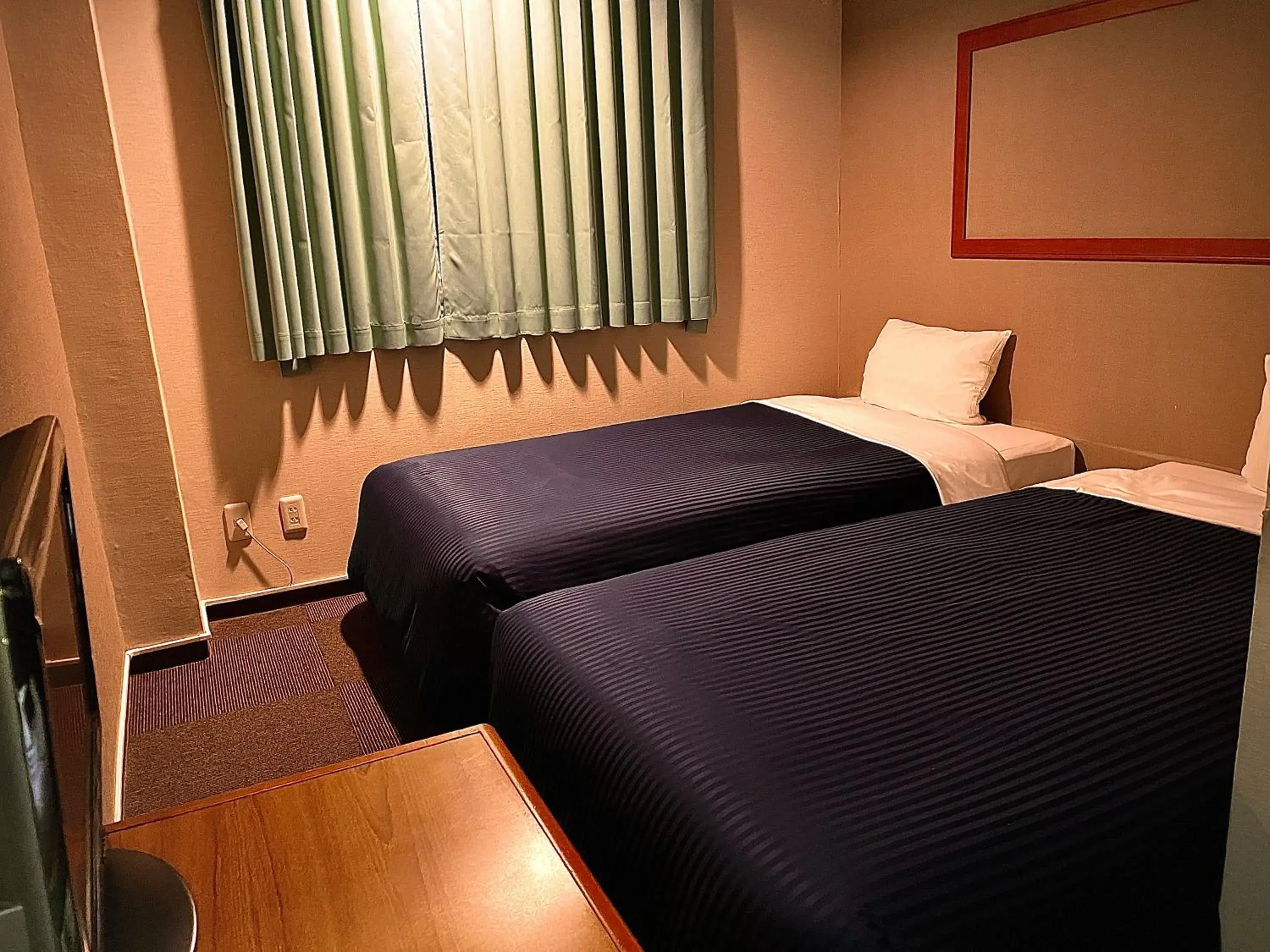 Twin Room in HOTEL THE NEXT KANKU Twin Room in HOTEL THE NEXT KANKU