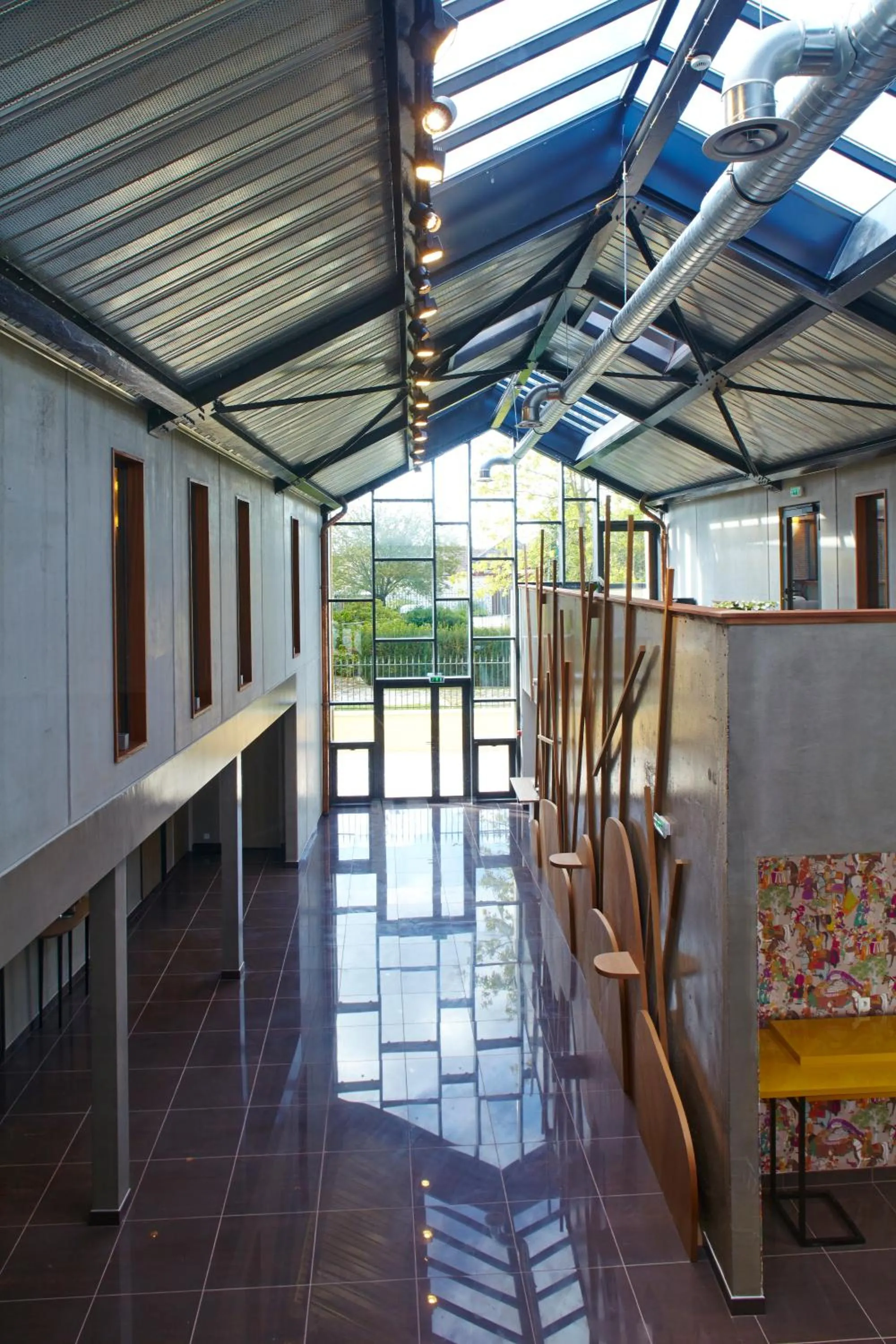 Lobby or reception in Hôtel Les Herbes Folles