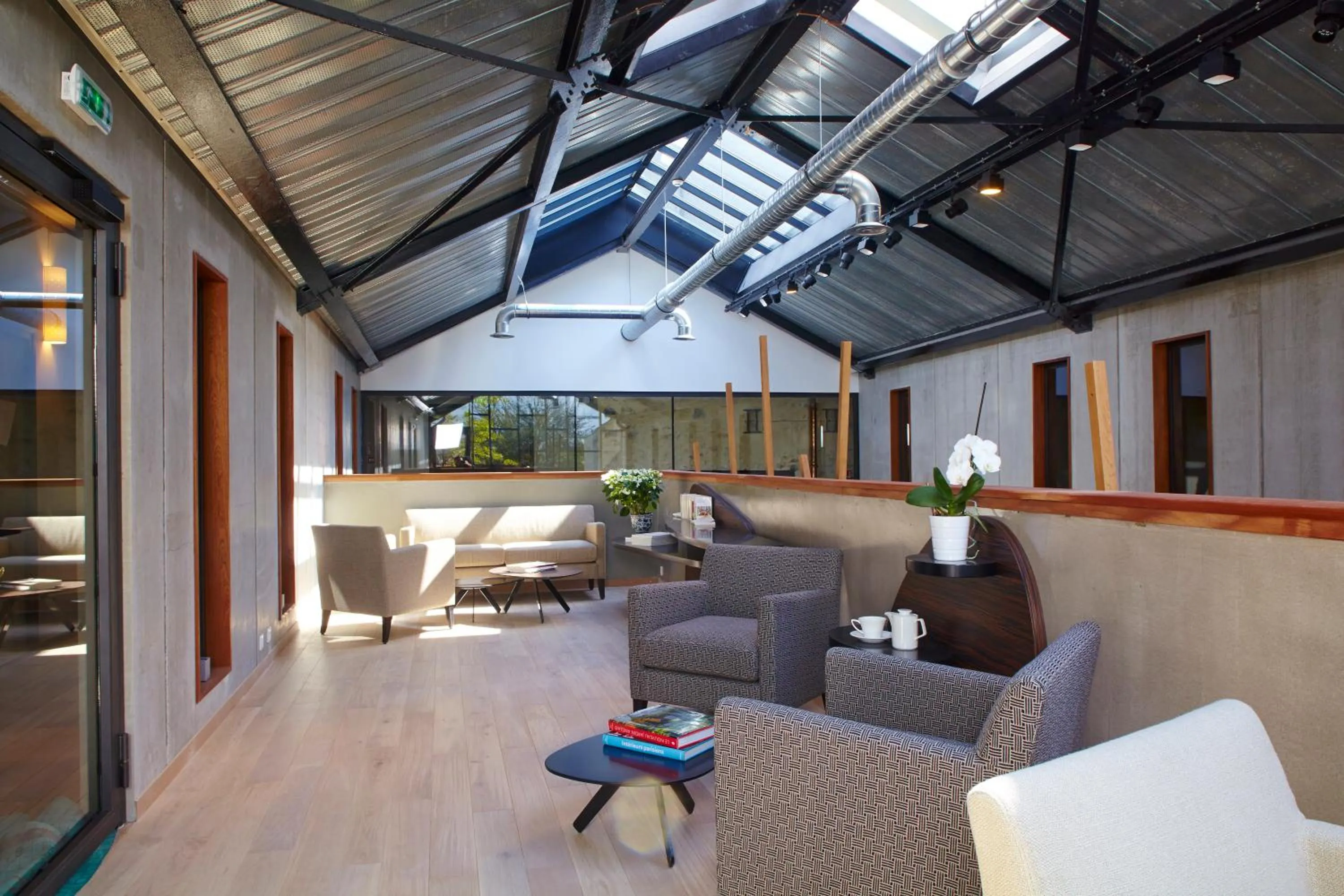 Lounge or bar in Hôtel Les Herbes Folles