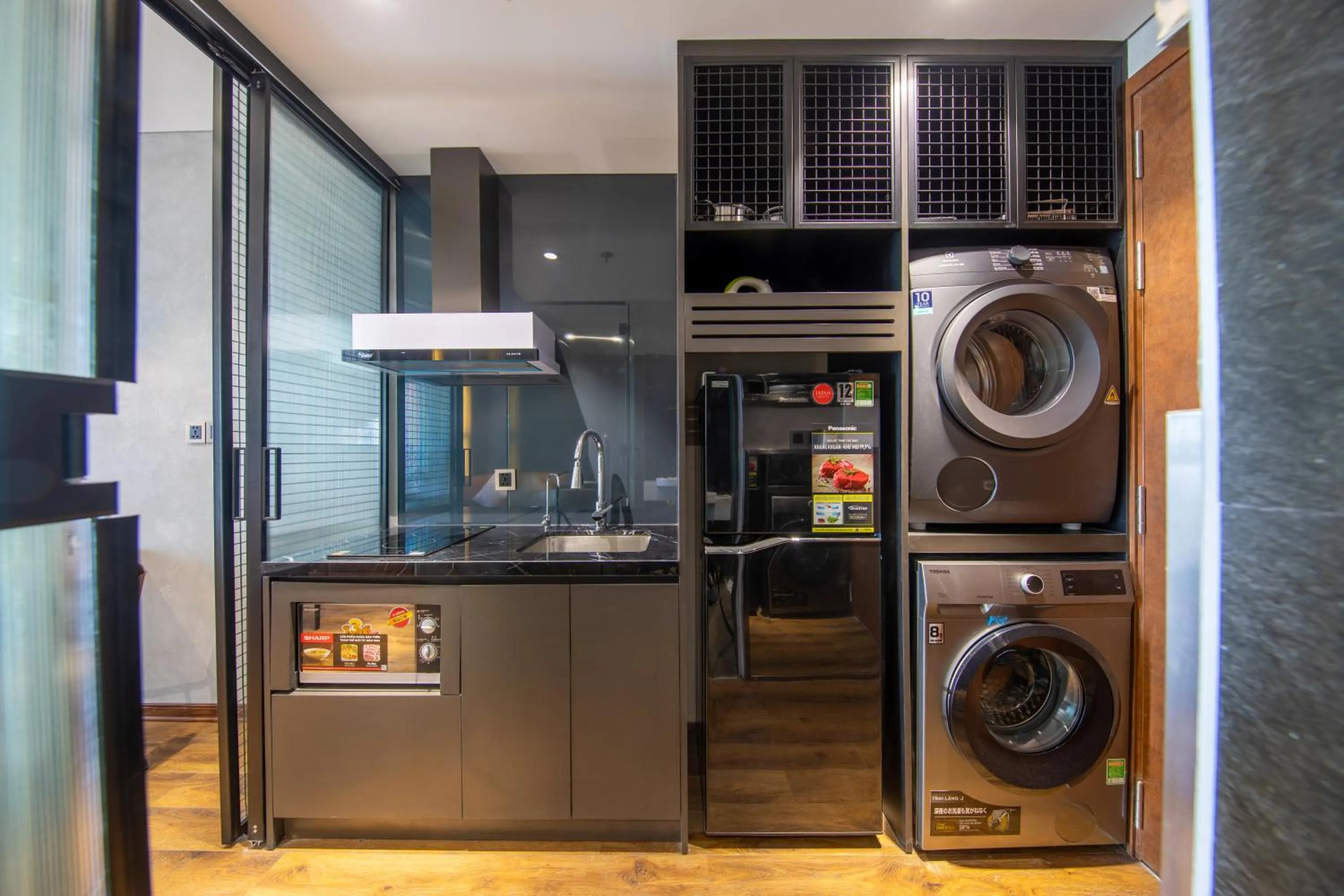 Kitchen or kitchenette in Taiyo Hotel & Apartment