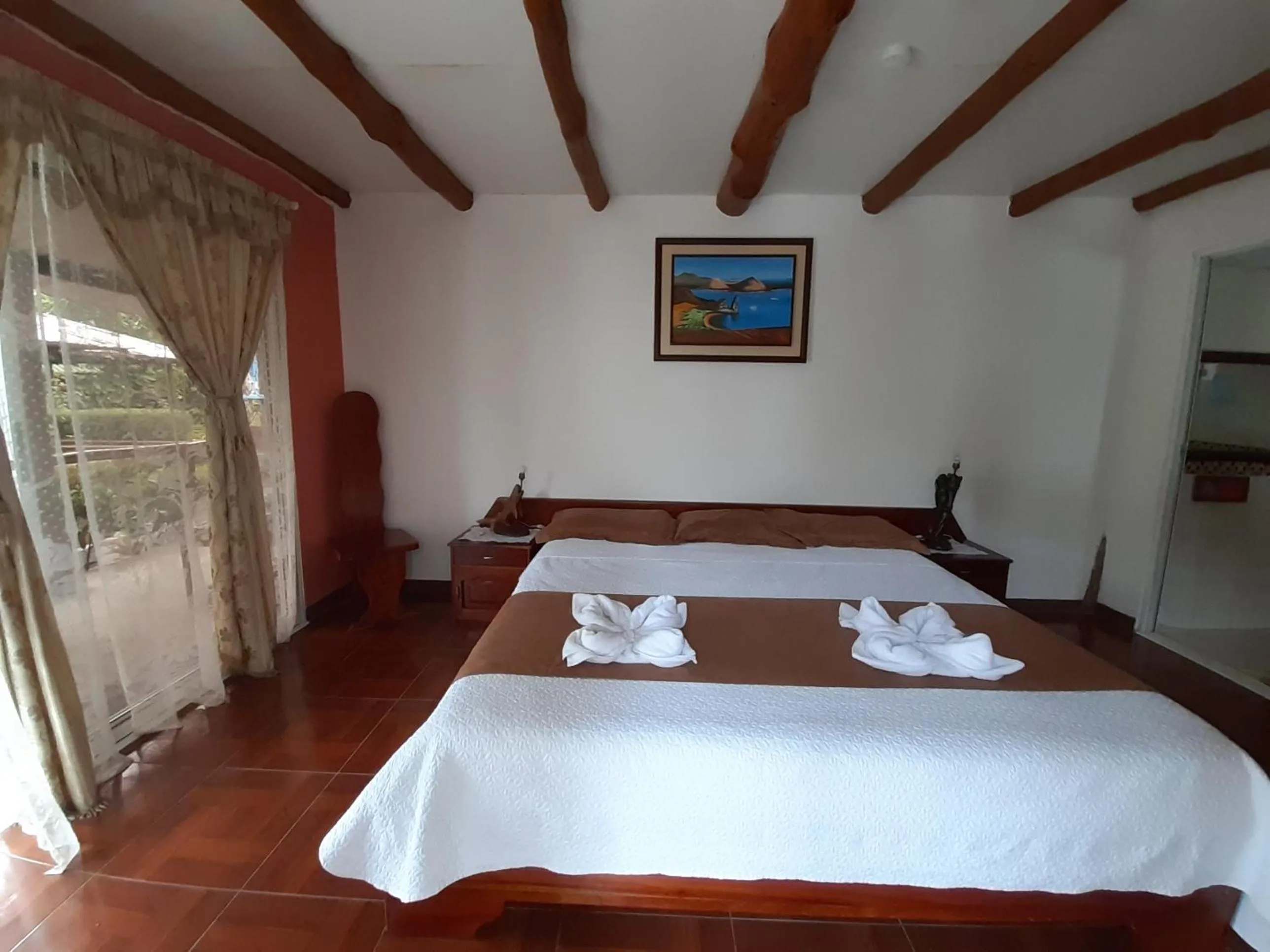 Bed in Suymar Ecolodge Galapagos