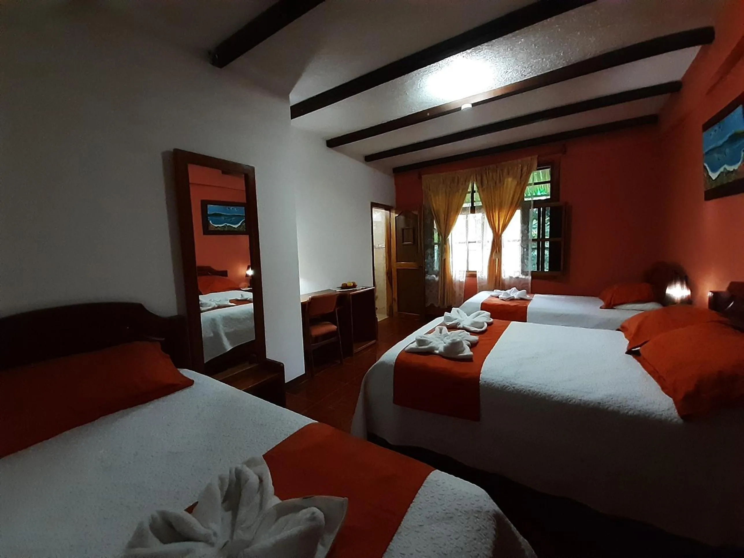 Bed in Suymar Ecolodge Galapagos